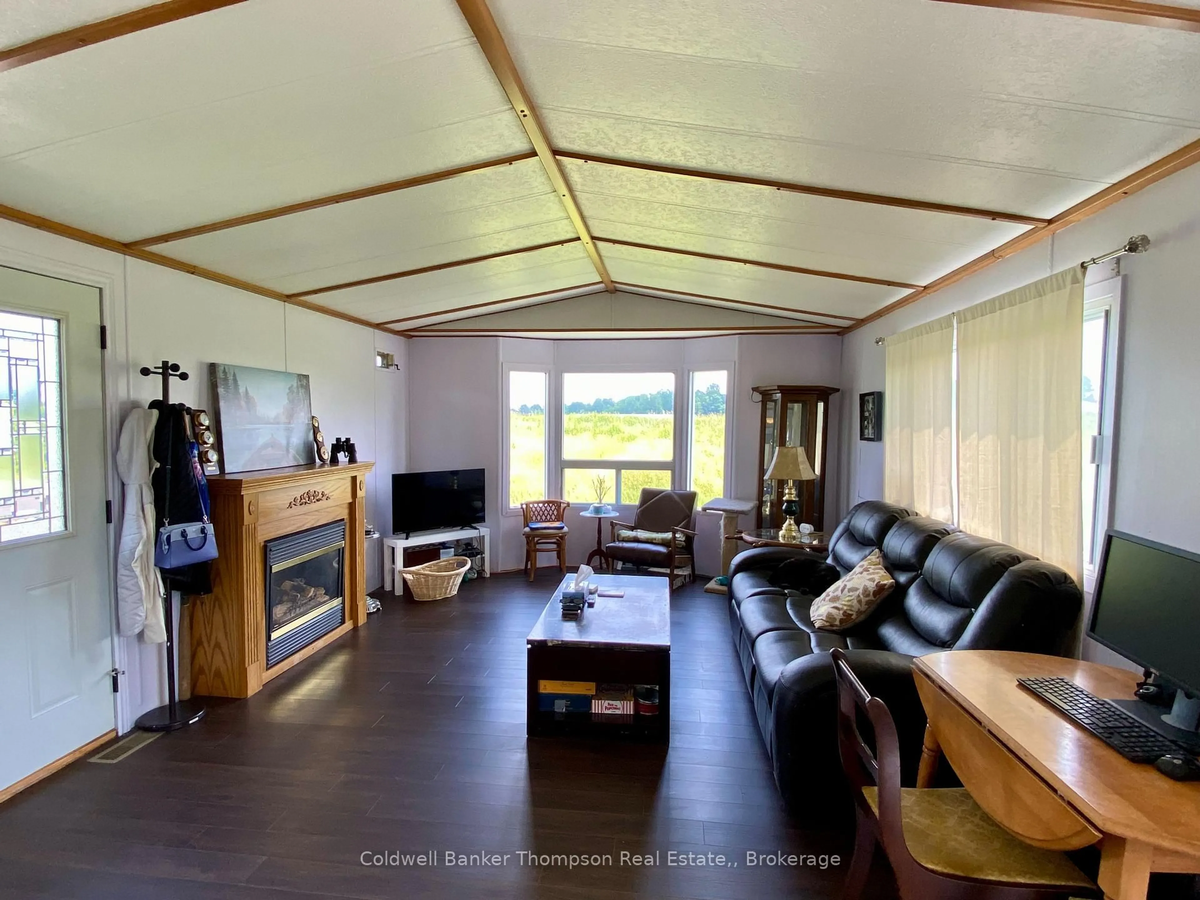 Living room with furniture, unknown for 28 HILLTOP Rd, Parry Sound Remote Area Ontario P0H 1A0