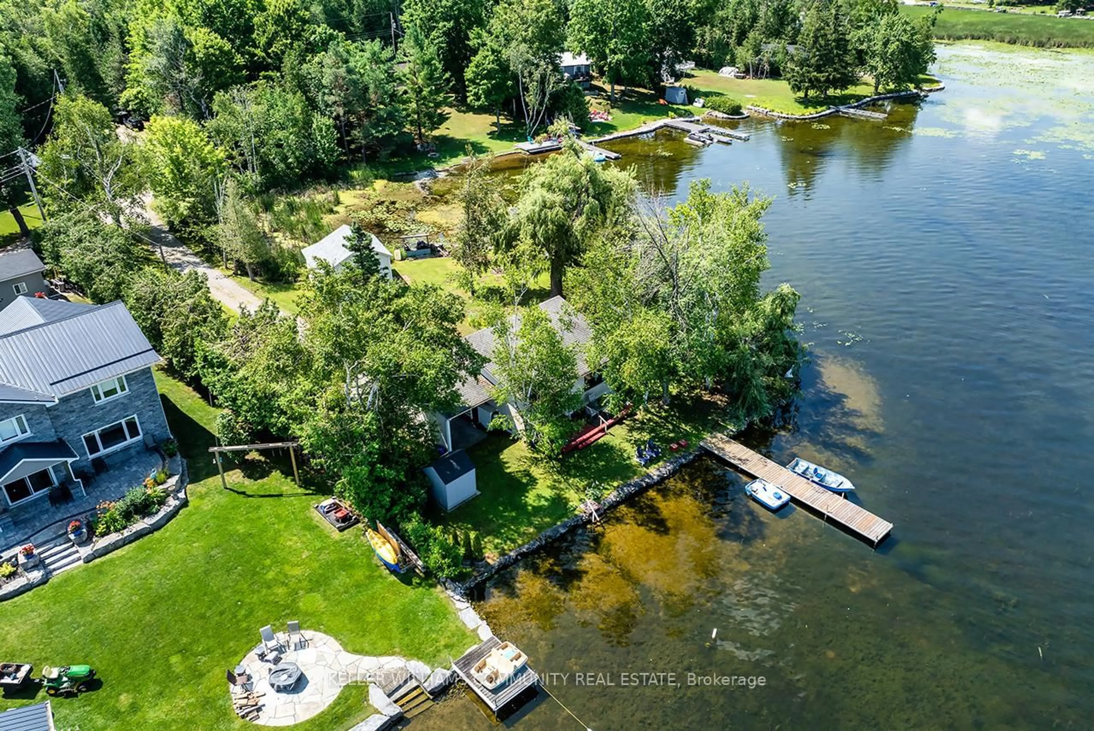 A pic from outside/outdoor area/front of a property/back of a property/a pic from drone, water/lake/river/ocean view for 1370 Dunmanus Dr, Selwyn Ontario K0L 1T0
