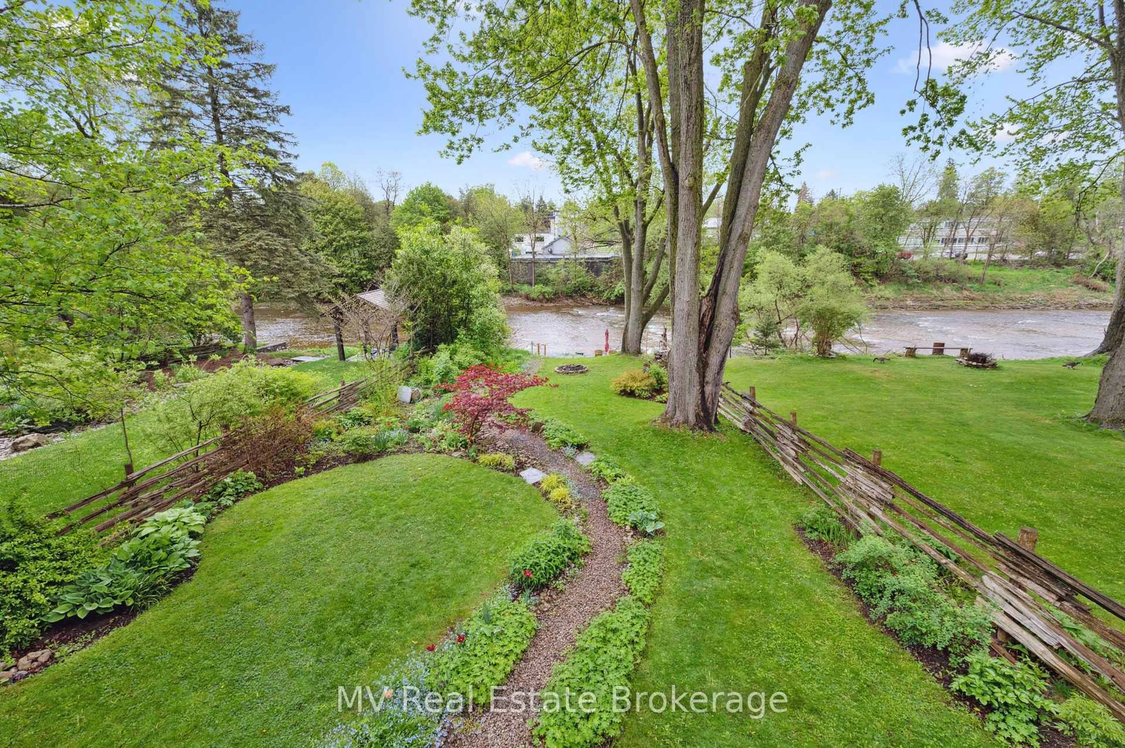 A pic from outside/outdoor area/front of a property/back of a property/a pic from drone, water/lake/river/ocean view for 270 St Andrew St, Centre Wellington Ontario N1M 1R1