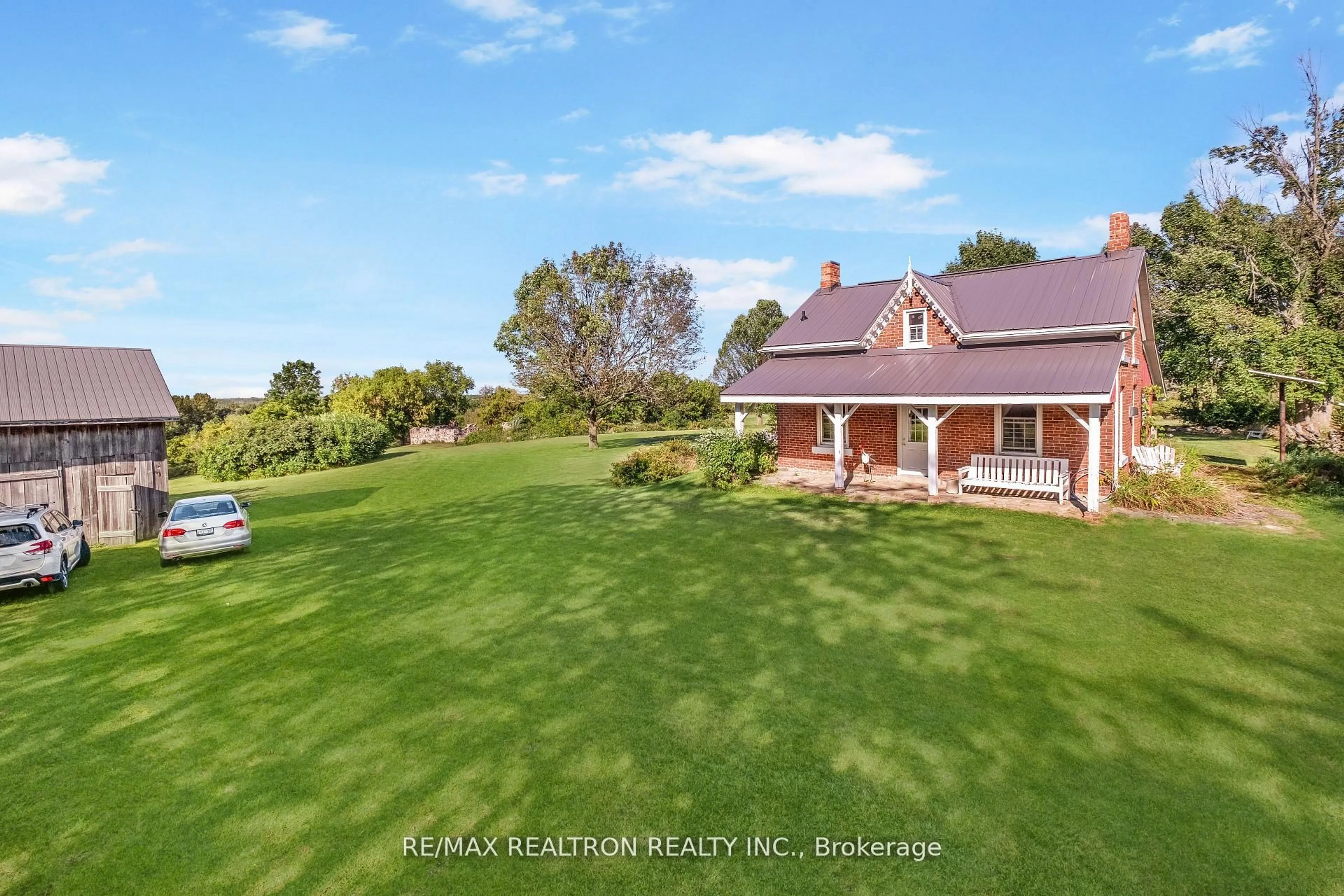 A pic from outside/outdoor area/front of a property/back of a property/a pic from drone, mountain view for 499437 6Th Concession Rd, Meaford Ontario N4K 5W4