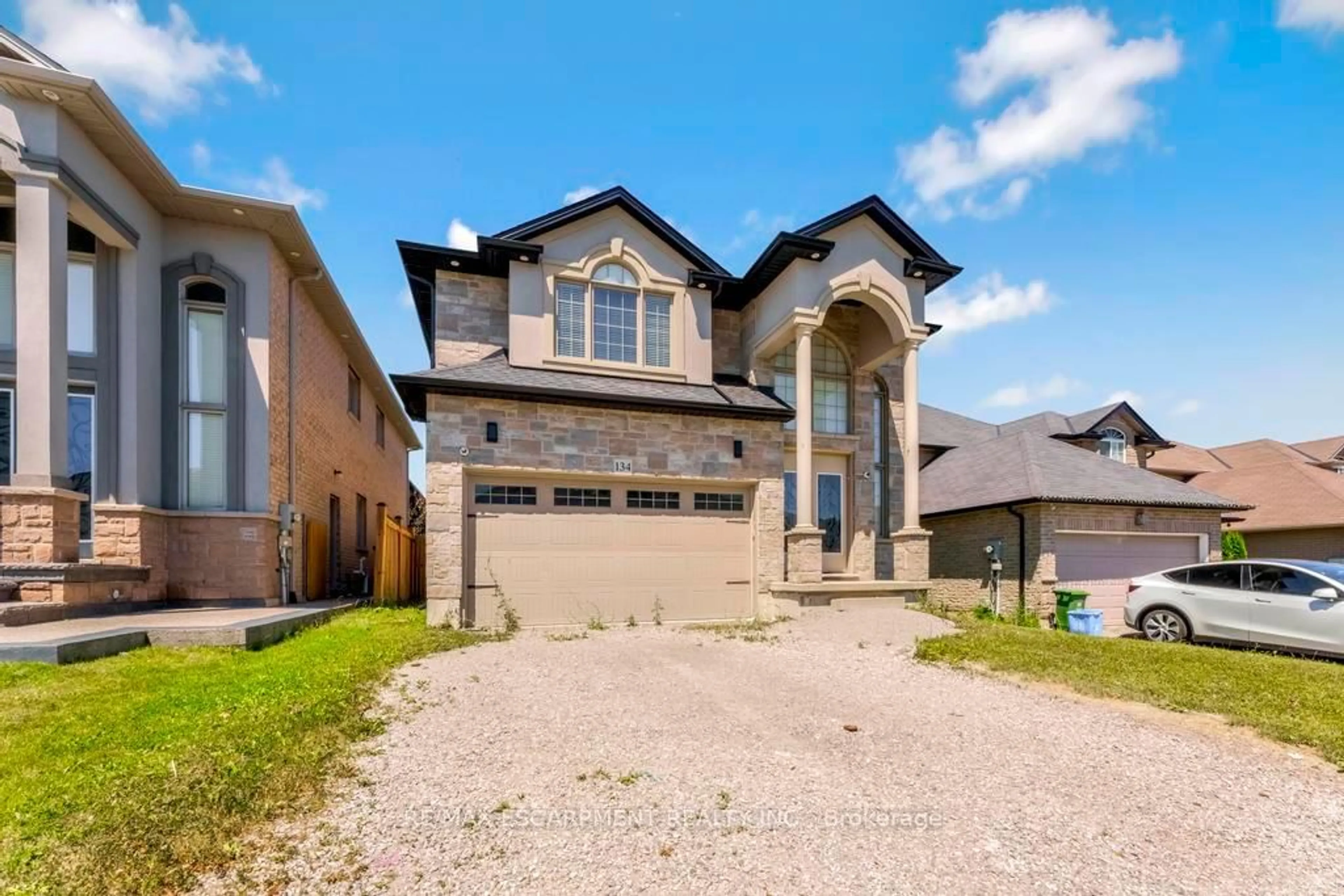 Home with brick exterior material, street for 134 Davinci Blvd, Hamilton Ontario L9B 0C3