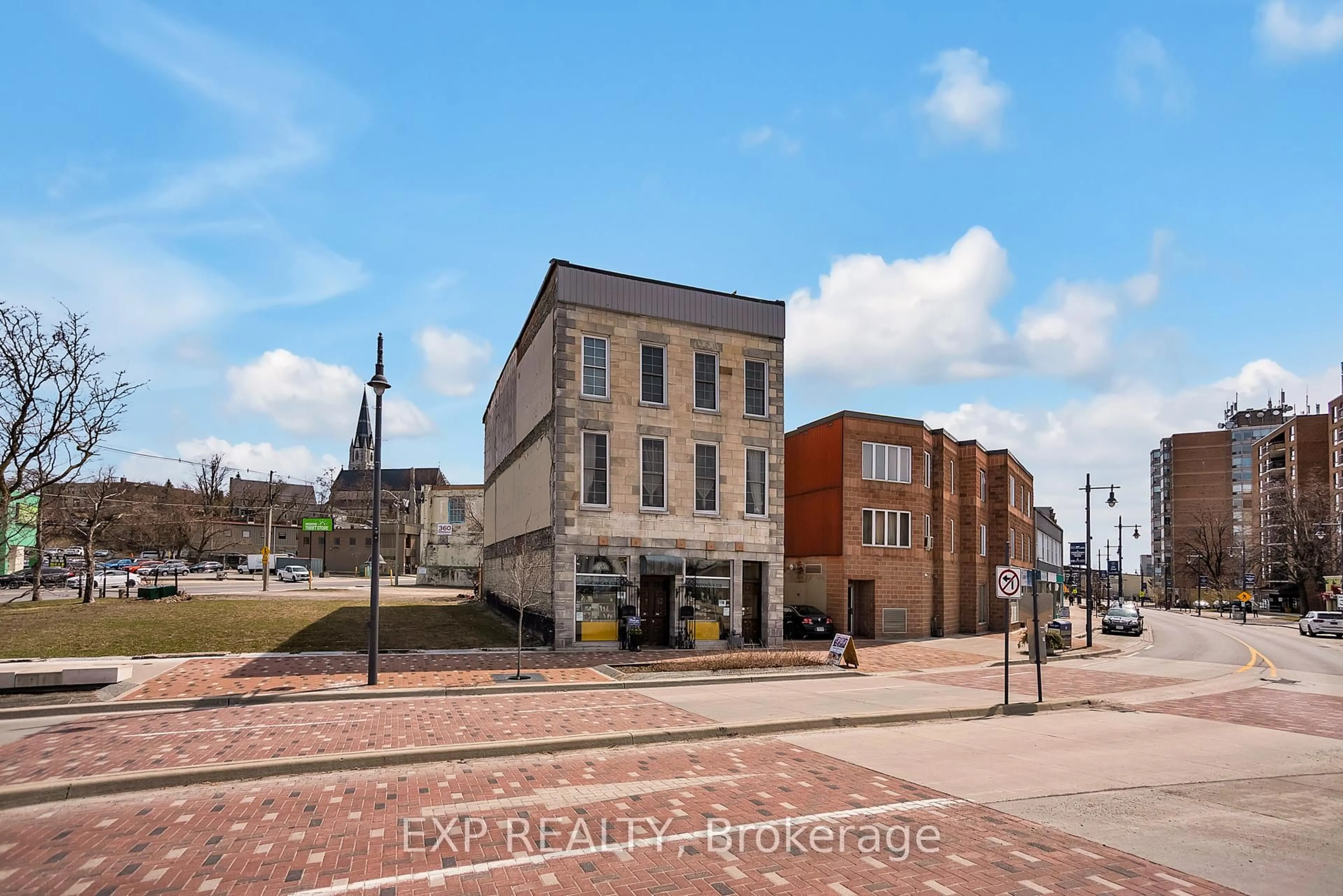 A pic from outside/outdoor area/front of a property/back of a property/a pic from drone, street for 393 Front St #1, Belleville Ontario K8N 2Z9