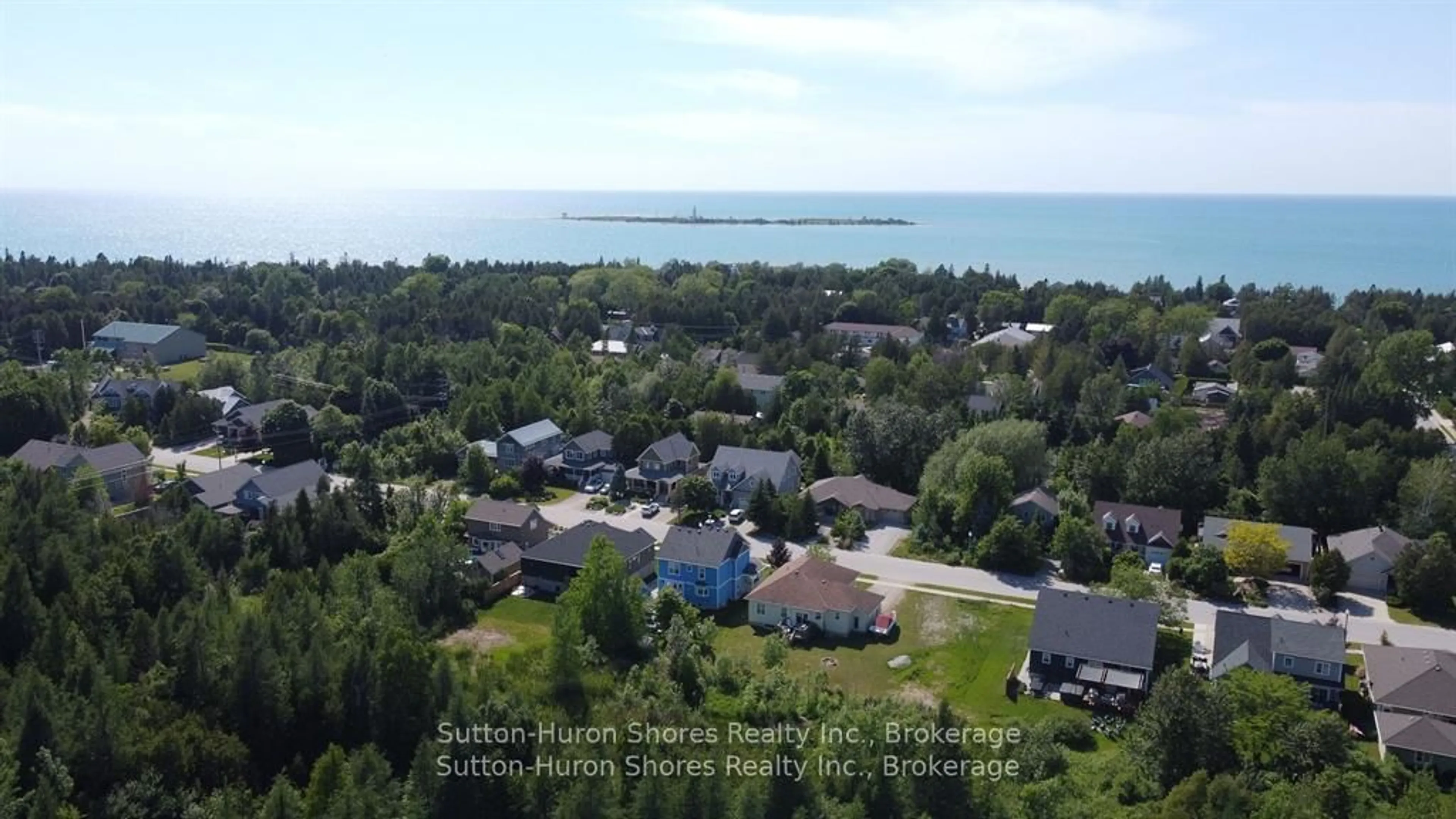A pic from outside/outdoor area/front of a property/back of a property/a pic from drone, water/lake/river/ocean view for 229 ADELAIDE St #114, Saugeen Shores Ontario N0H 2L0