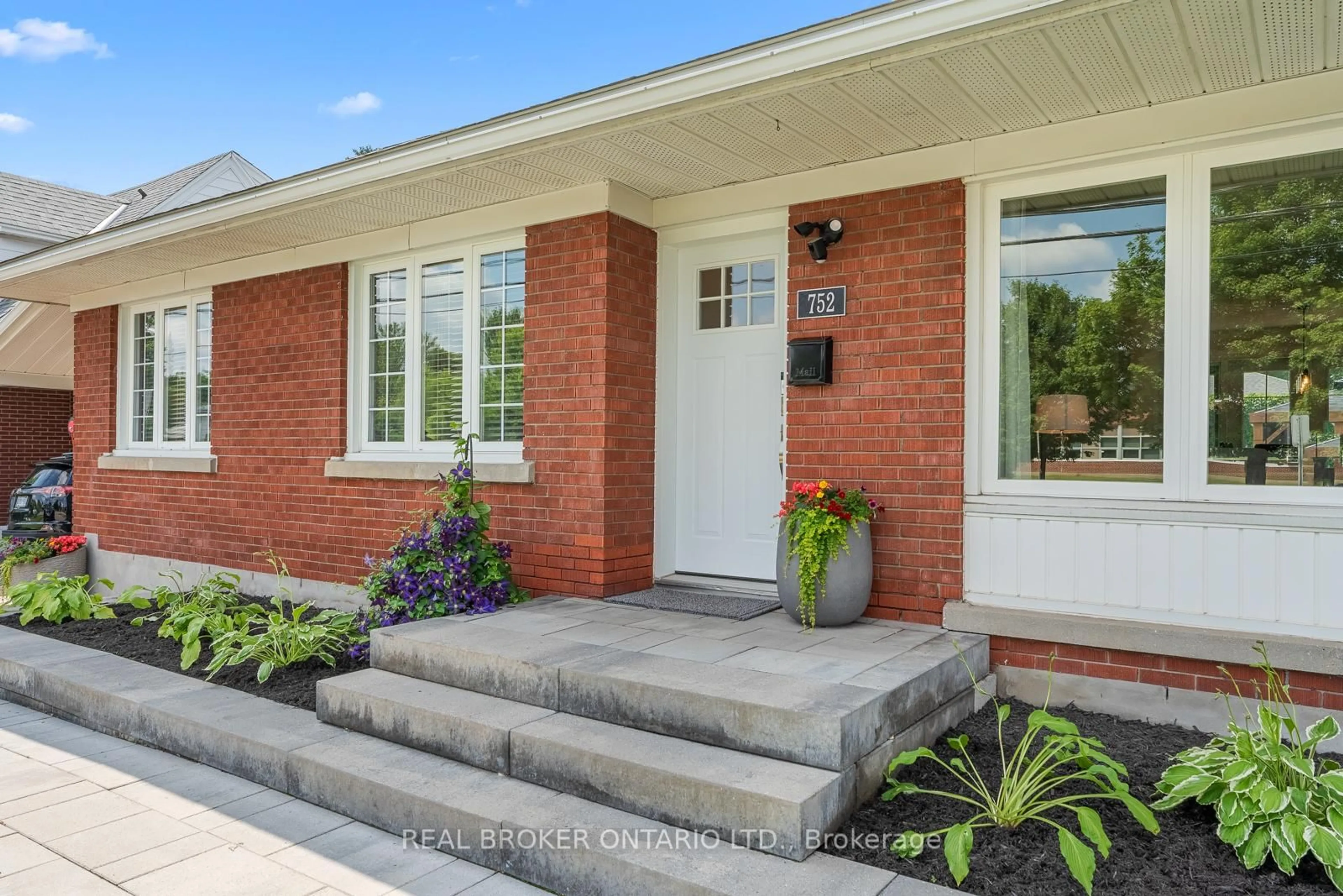 Home with brick exterior material, street for 752 Smyth Rd, Ottawa Ontario K1G 1P1