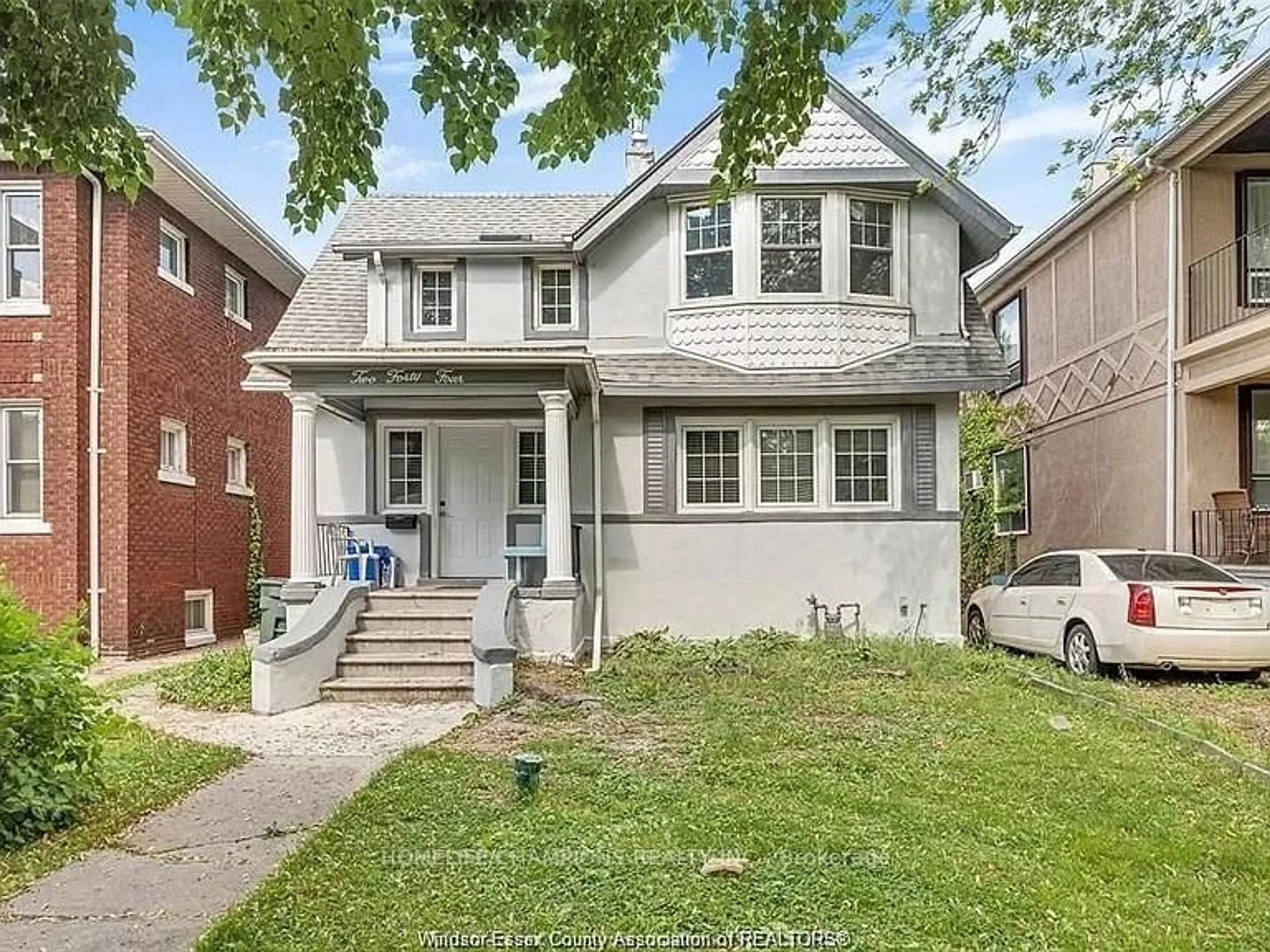 Home with brick exterior material, street for 244 Mcewan Ave, Windsor Ontario N9B 2E4