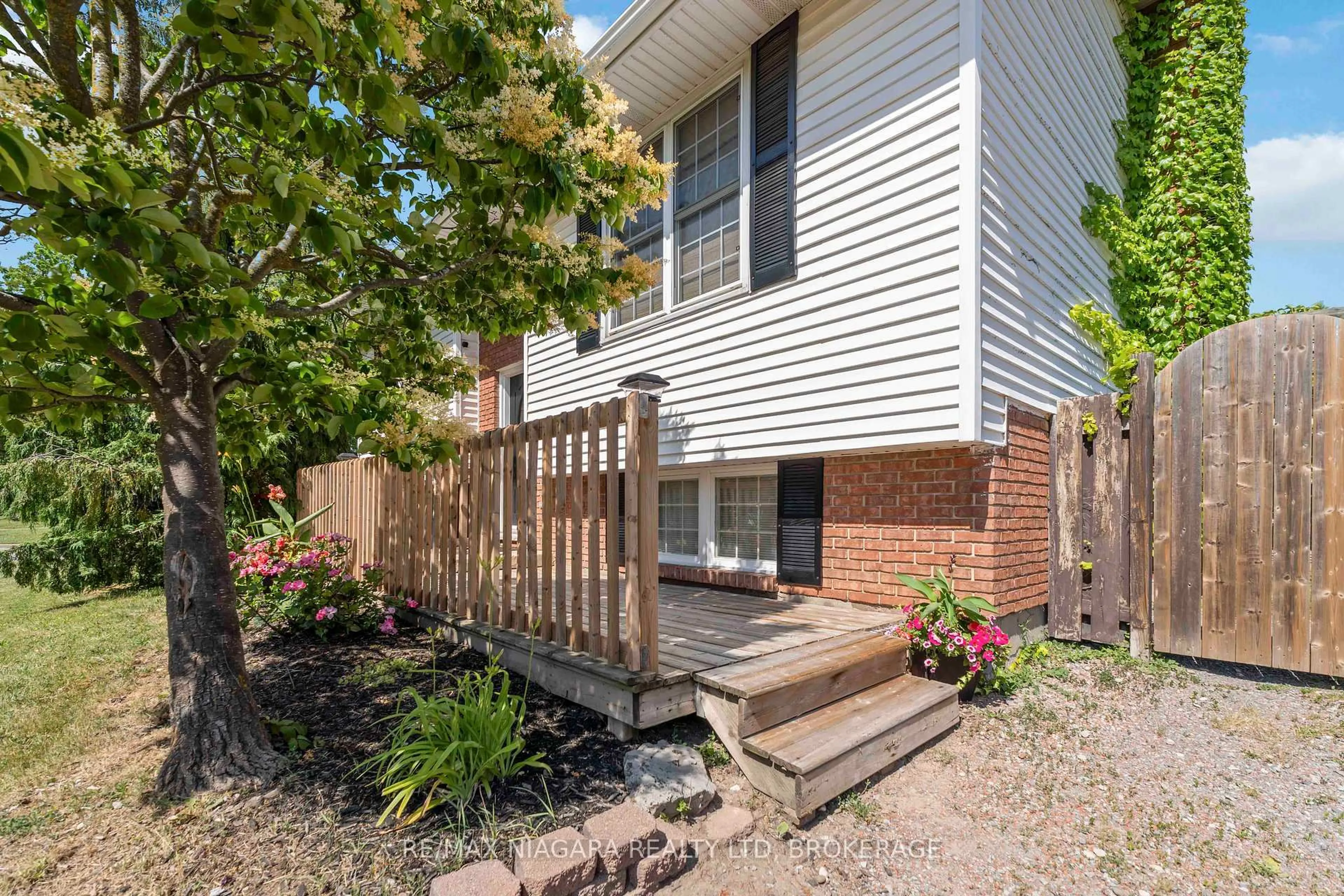 Home with brick exterior material, street for 91 Woodrow St, St. Catharines Ontario L2P 3S2