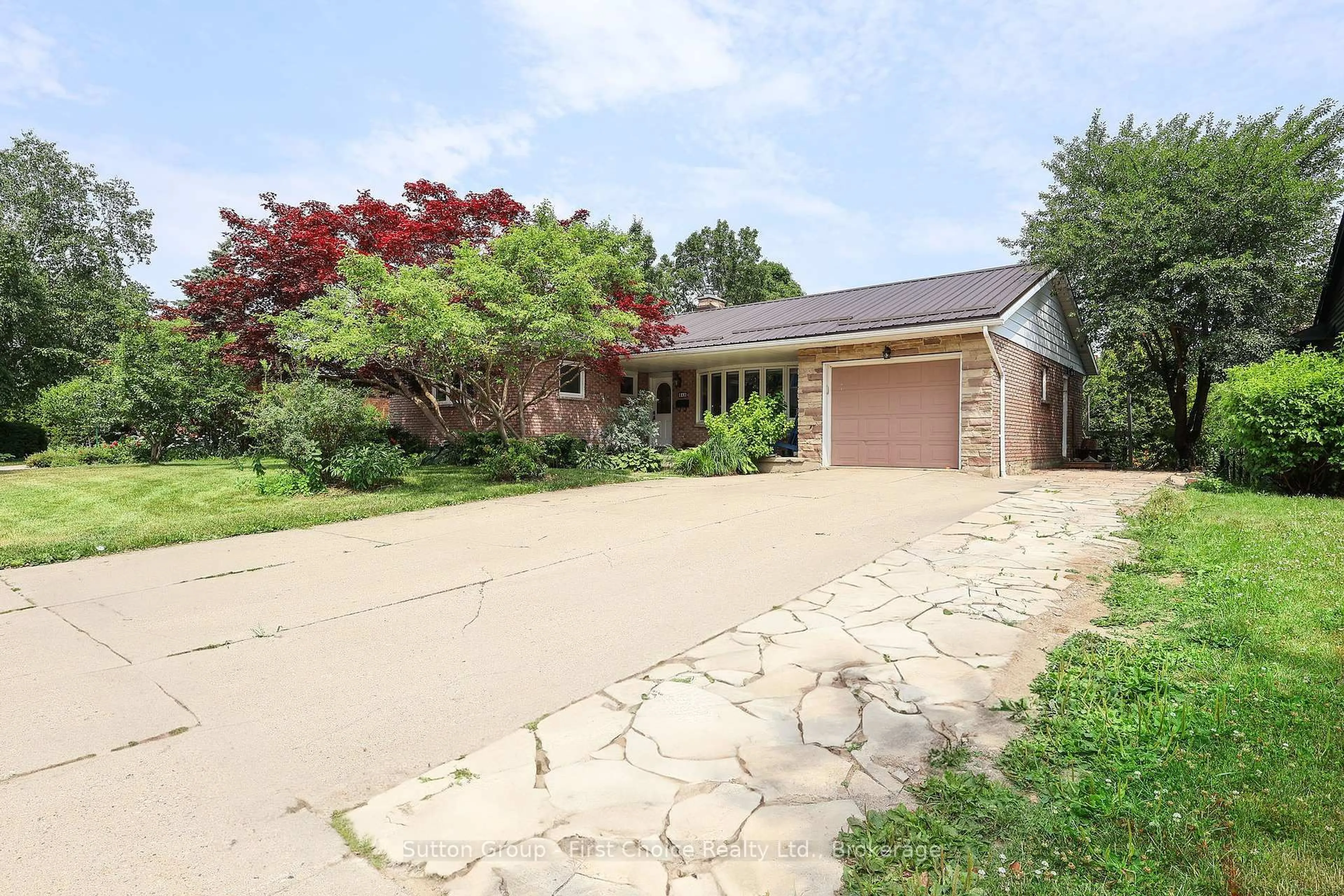 Home with brick exterior material, street for 348 DEVON St, Stratford Ontario N5A 2Z9