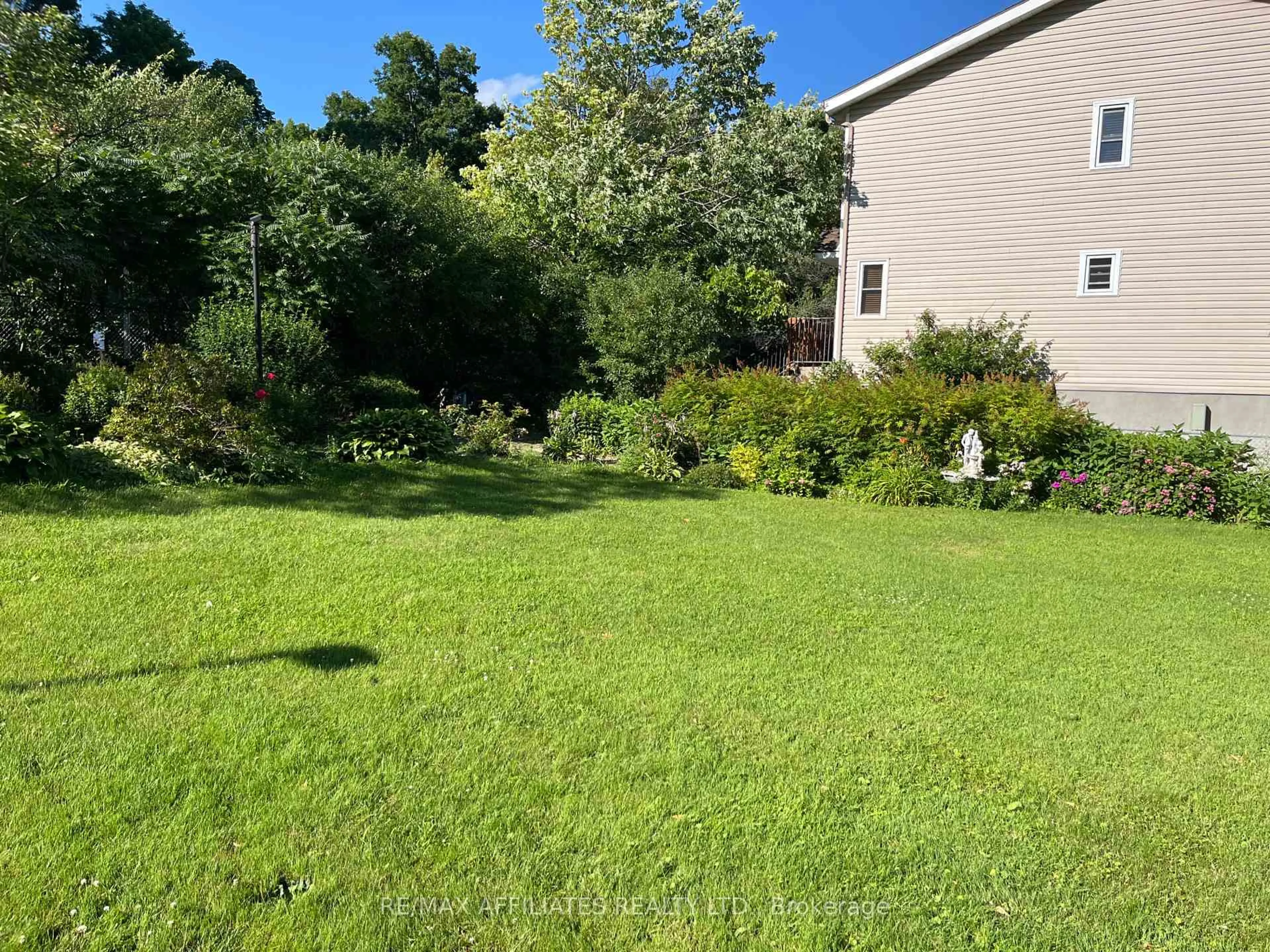 A pic from outside/outdoor area/front of a property/back of a property/a pic from drone, forest/trees view for 555 BRITTANY Dr #407, Ottawa Ontario K1K 4C5