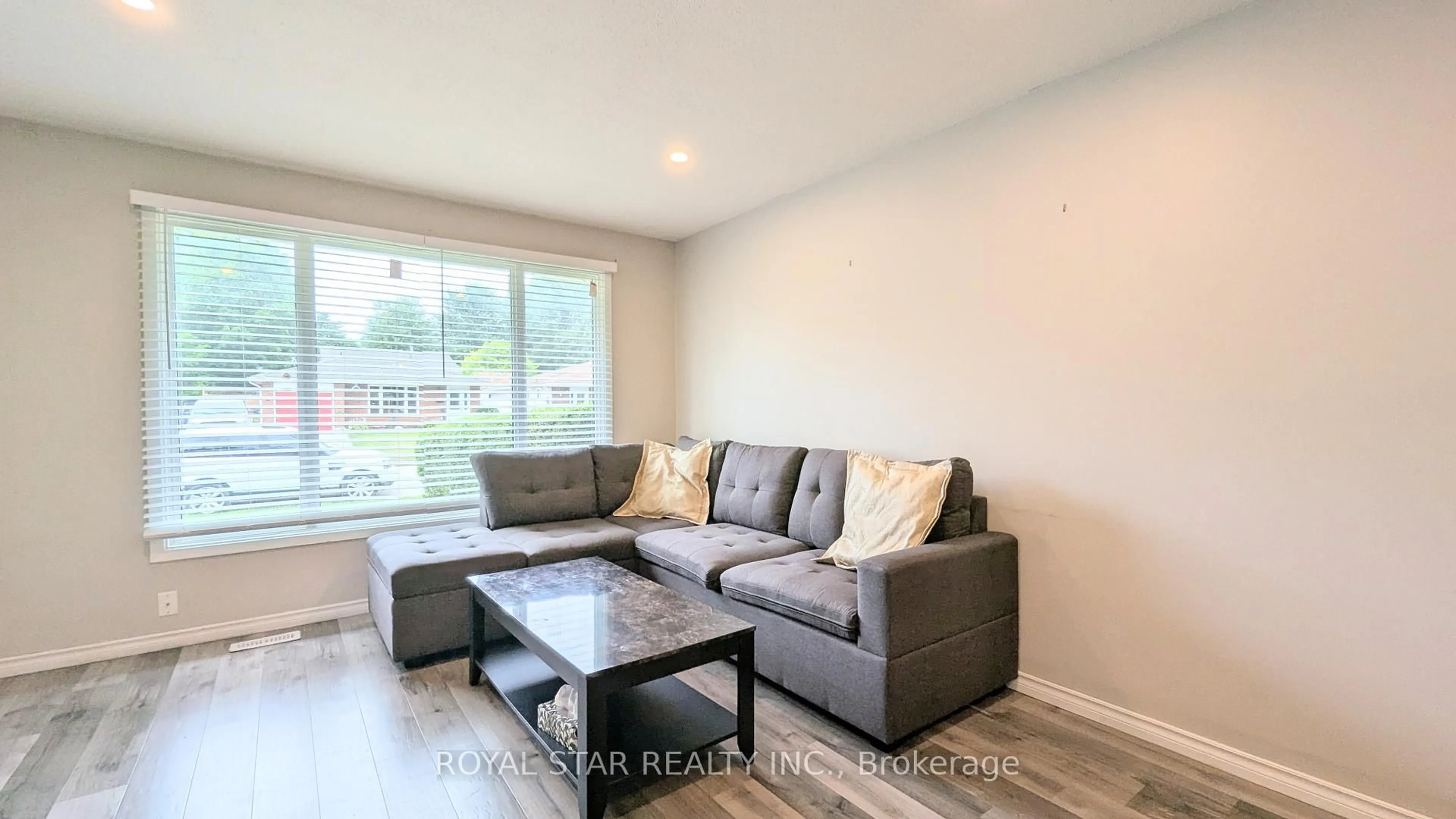 Living room with furniture, wood/laminate floor for 42 Witty Ave, Ingersoll Ontario N5C 3P3