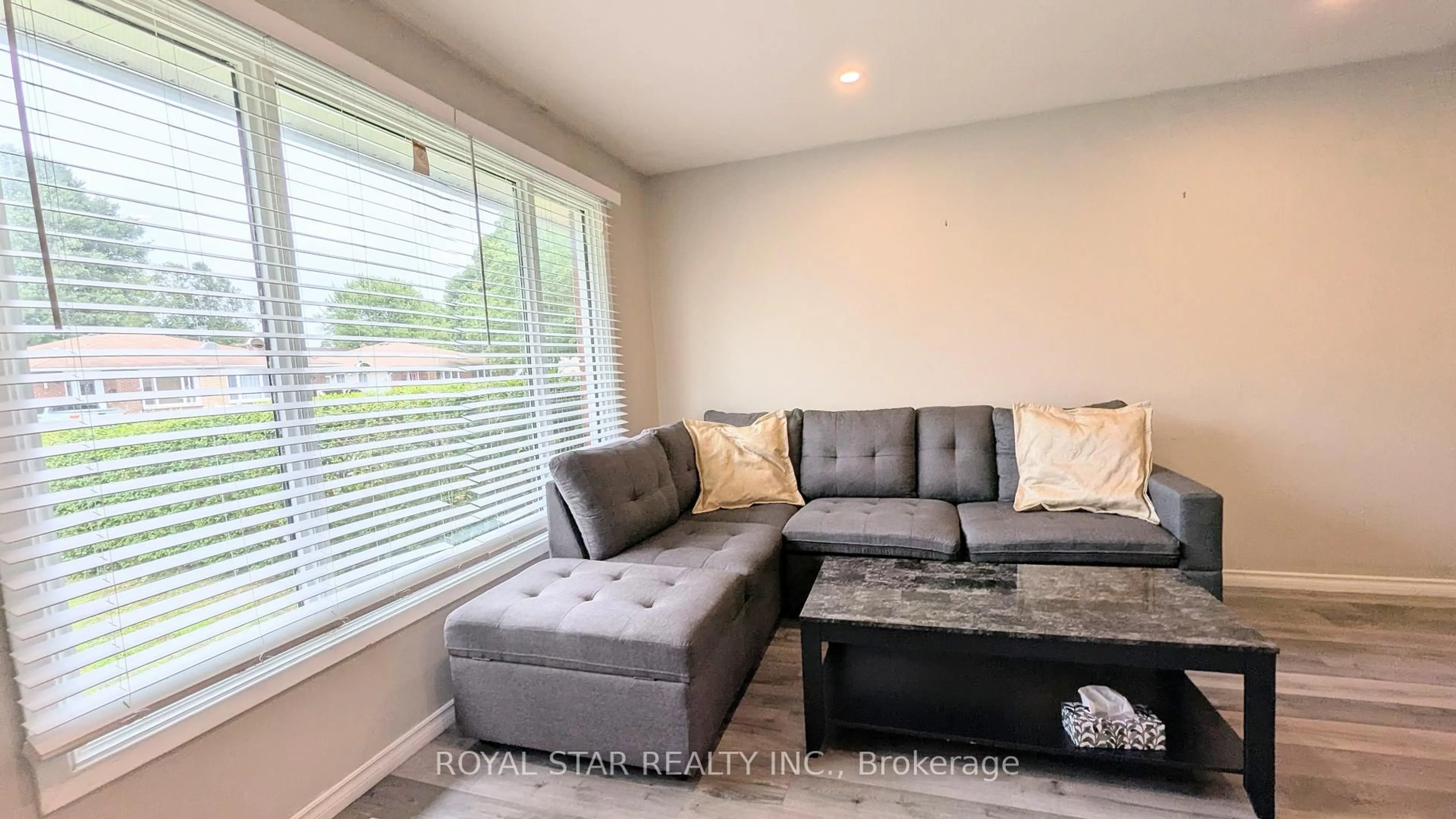 Living room with furniture, wood/laminate floor for 42 Witty Ave, Ingersoll Ontario N5C 3P3