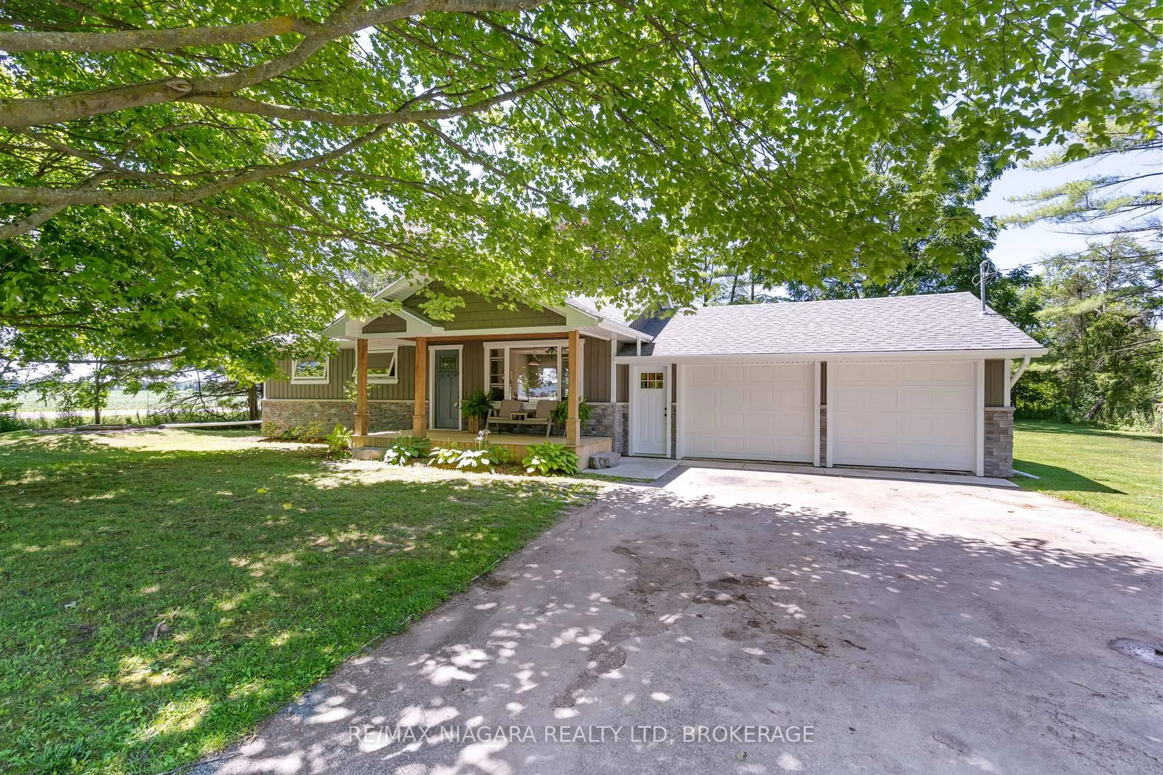 A pic from outside/outdoor area/front of a property/back of a property/a pic from drone, street for 43092 Wills Rd, Wainfleet Ontario L0S 1V0