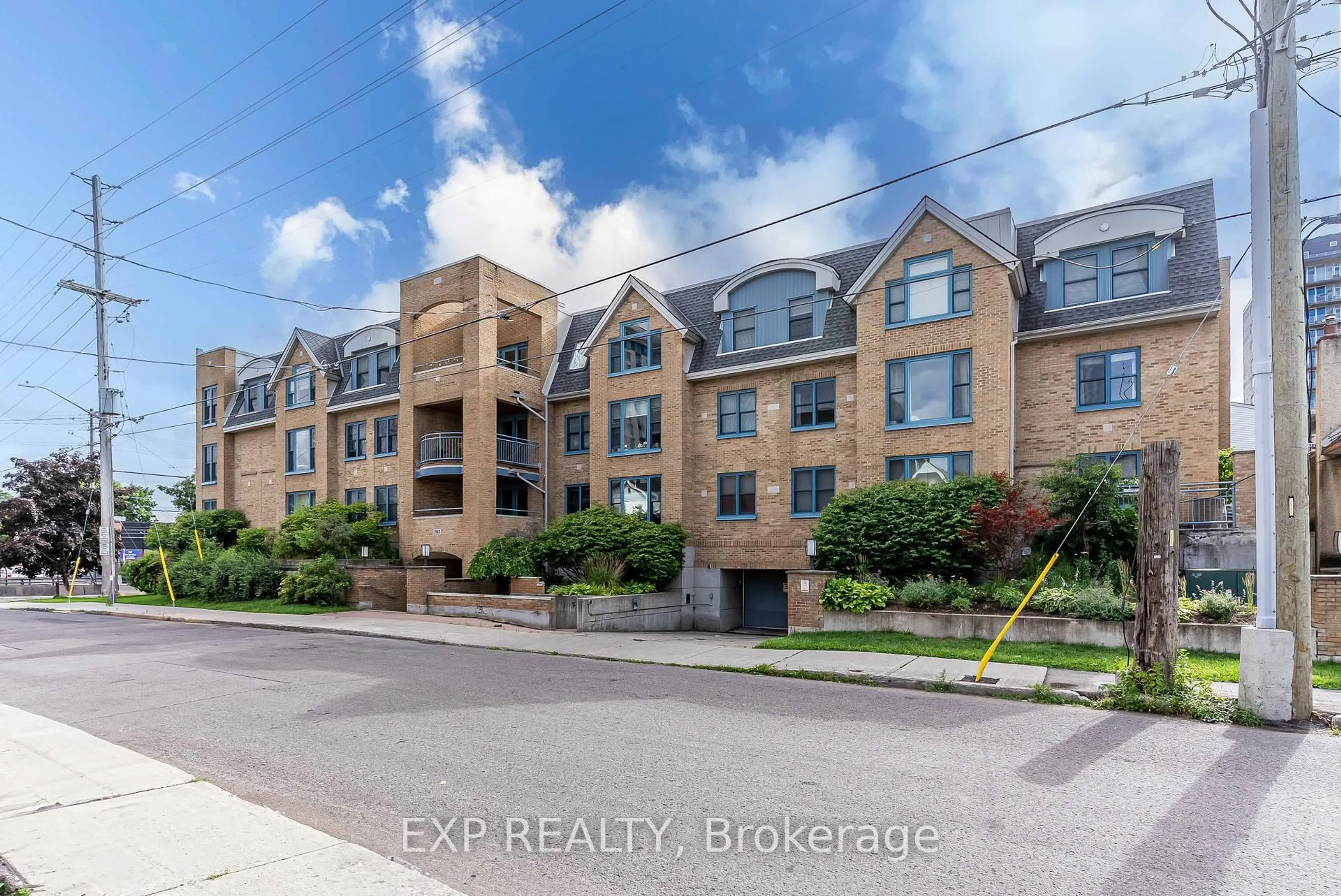 A pic from outside/outdoor area/front of a property/back of a property/a pic from drone, unknown for 202 Hinchey Ave #211, Ottawa Ontario K1Y 1L7
