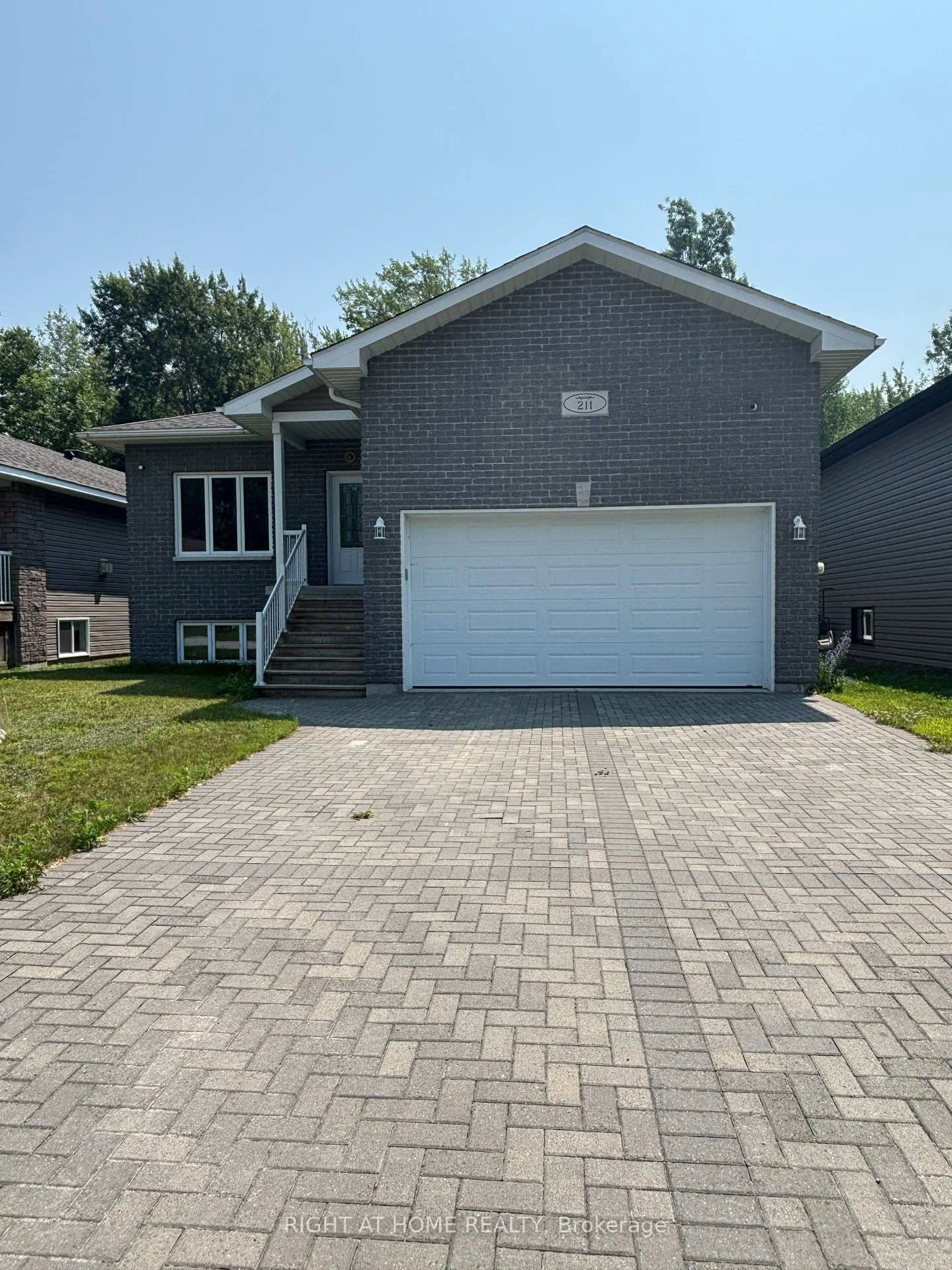 Home with brick exterior material, street for 211 Thelma Ave, North Bay Ontario P1A 4M9