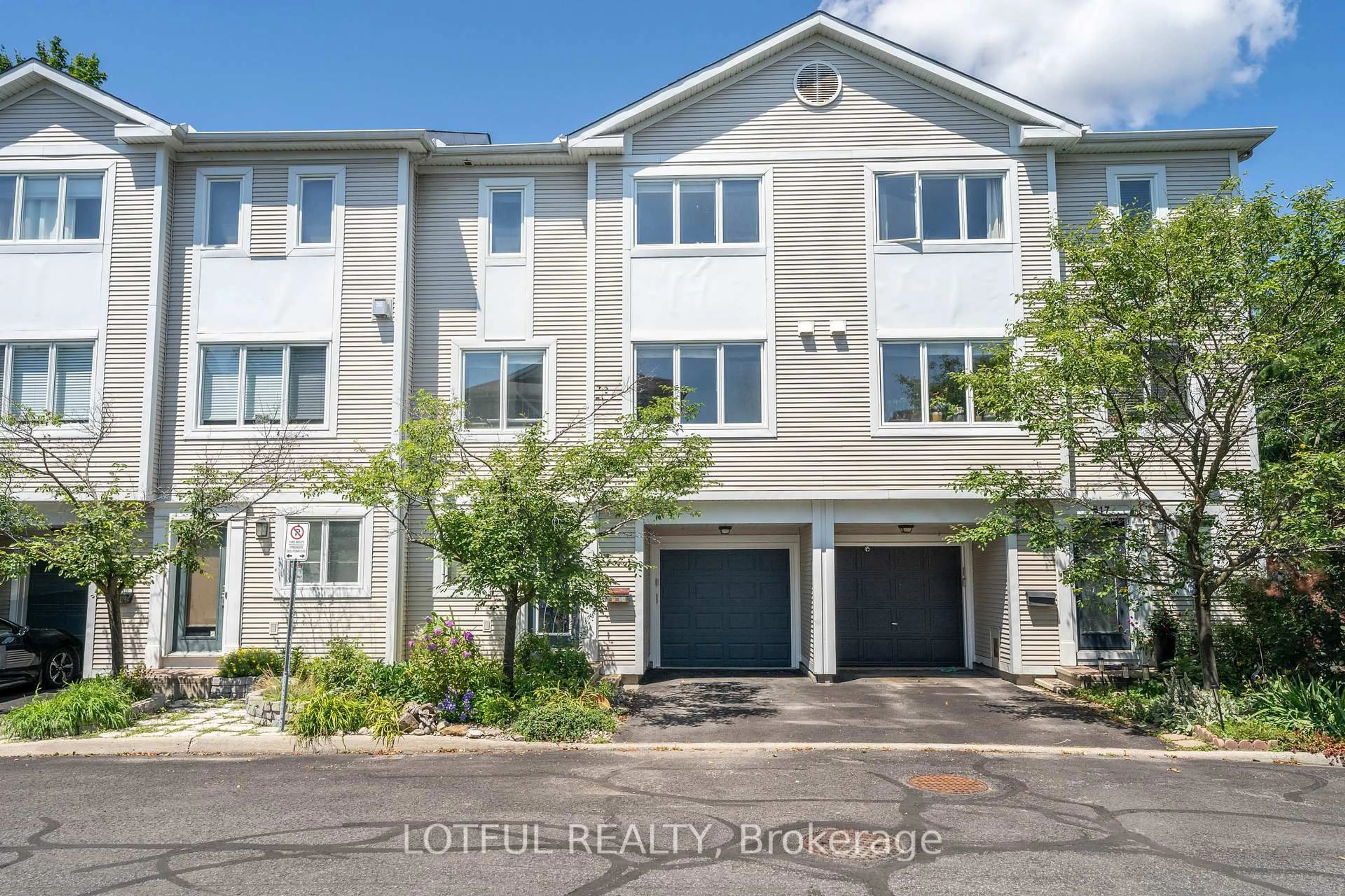 A pic from outside/outdoor area/front of a property/back of a property/a pic from drone, street for 515 Burleigh Private, Ottawa Ontario K1J 1J9