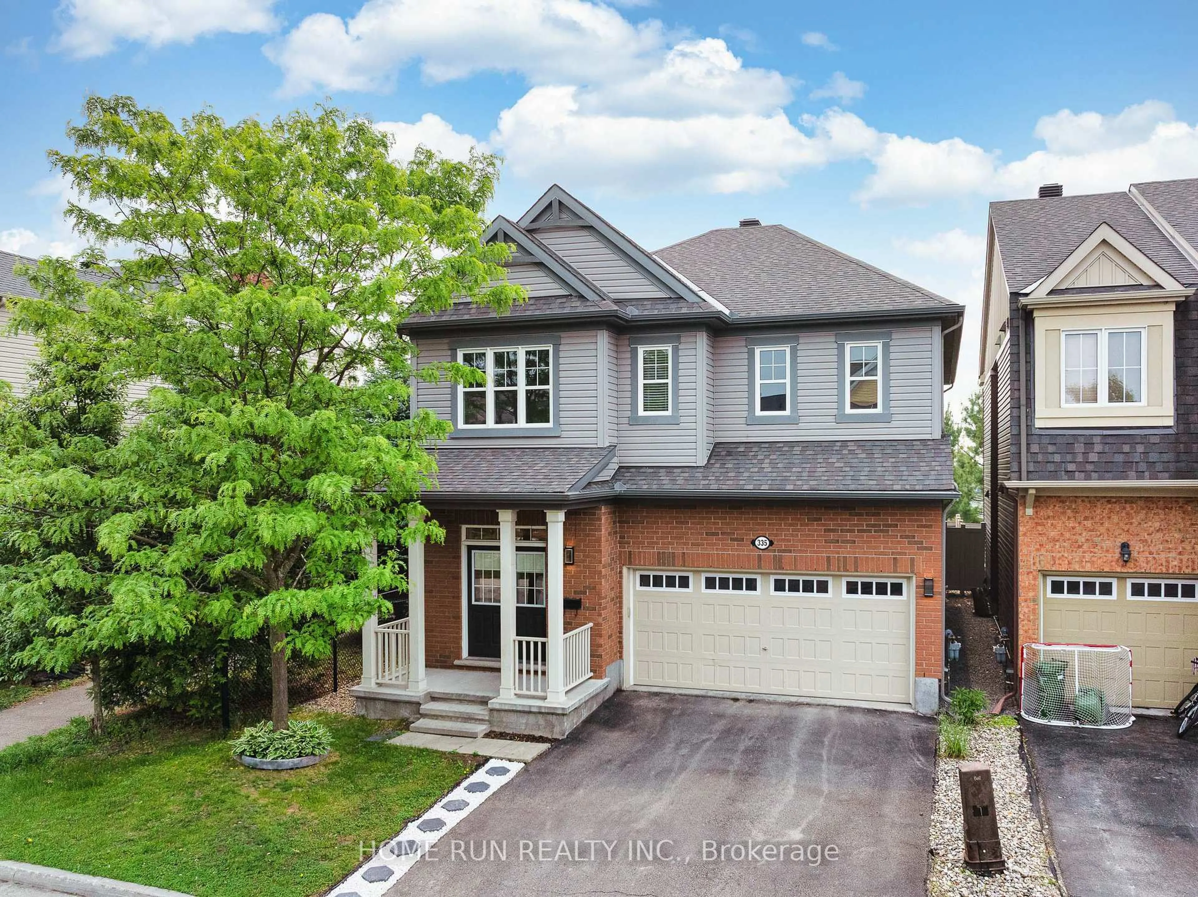 Home with brick exterior material, street for 335 Gallantry Way, Ottawa Ontario K2S 0P6