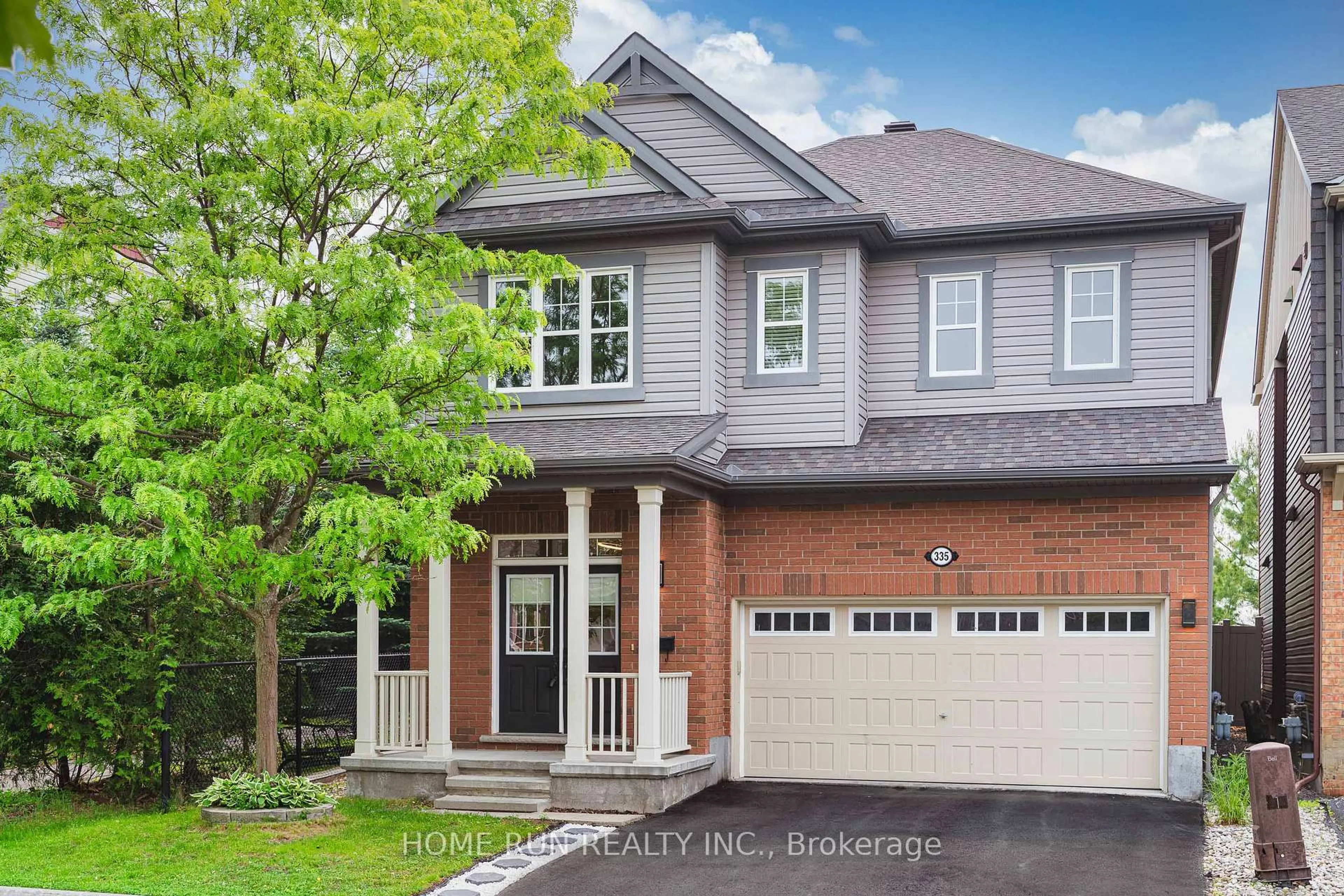 Home with brick exterior material, street for 335 Gallantry Way, Ottawa Ontario K2S 0P6