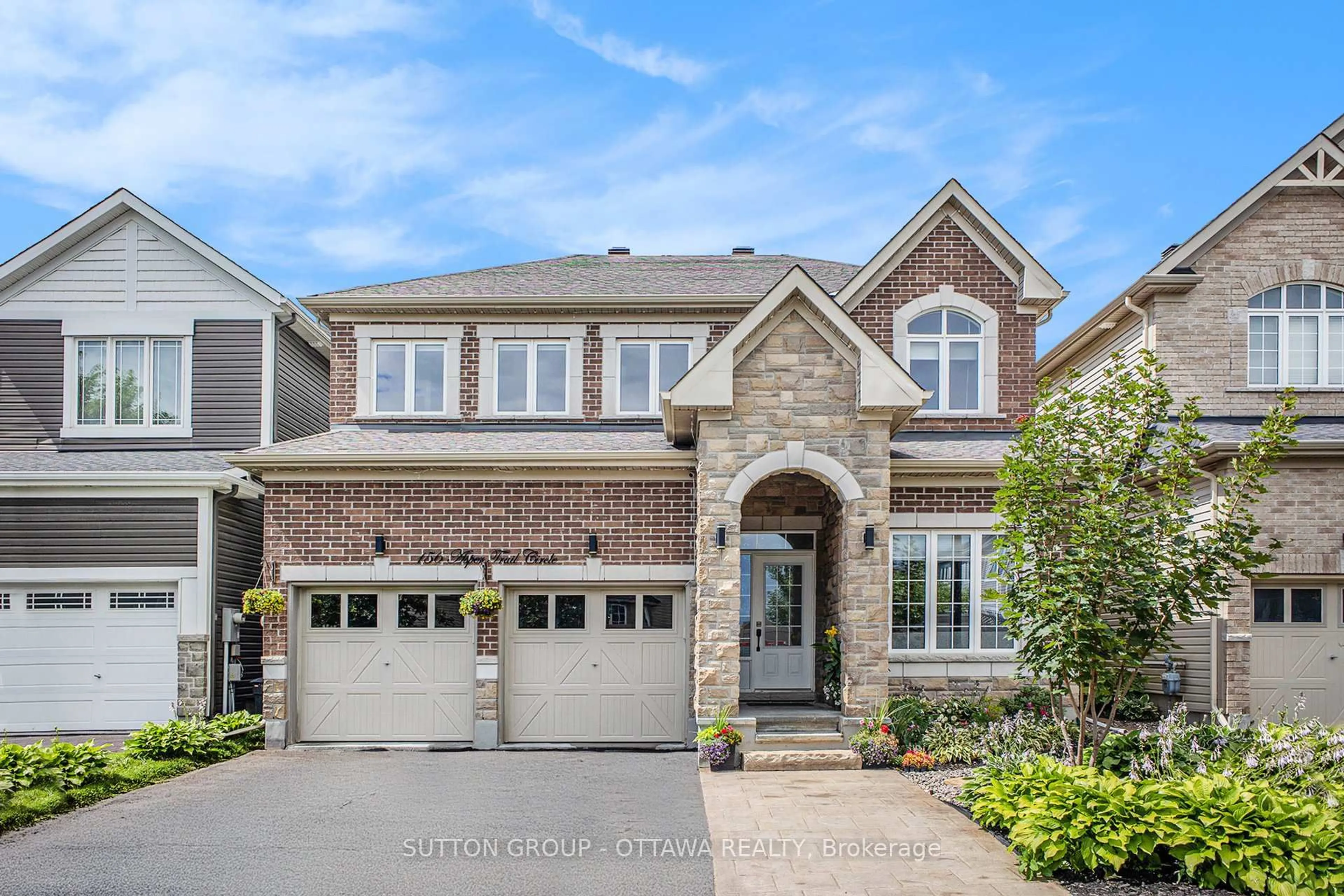 Home with brick exterior material, street for 156 Asper Trail Circ, Ottawa Ontario K2M 2T6