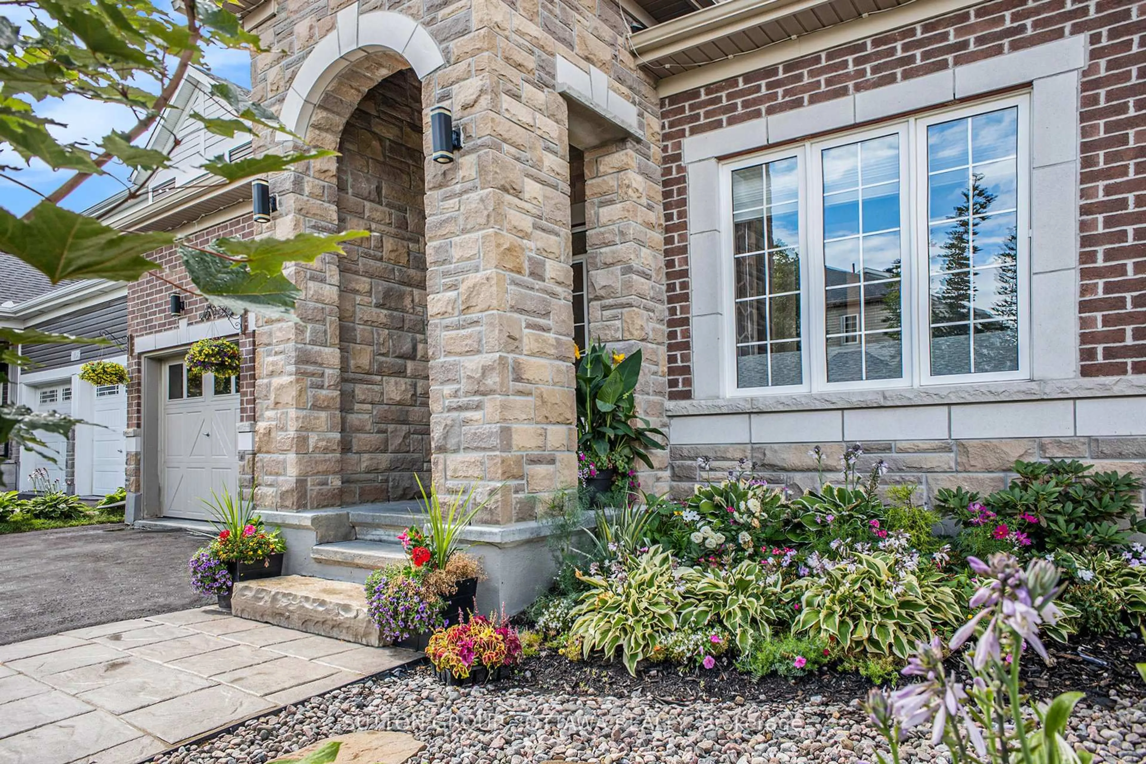 Home with brick exterior material, street for 156 Asper Trail Circ, Ottawa Ontario K2M 2T6