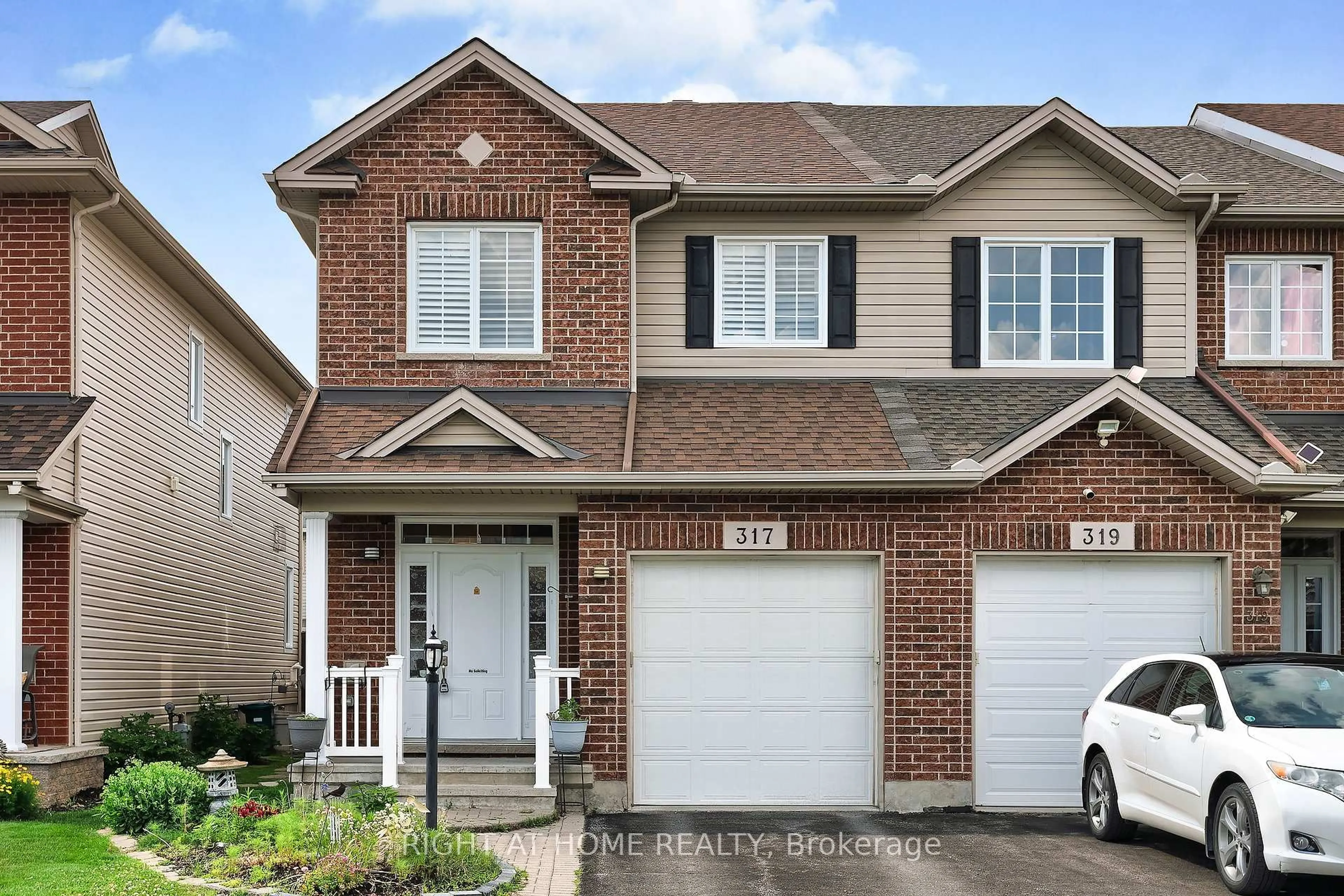 Home with brick exterior material, street for 317 Glenbrae Ave, Ottawa Ontario K2W 0B9