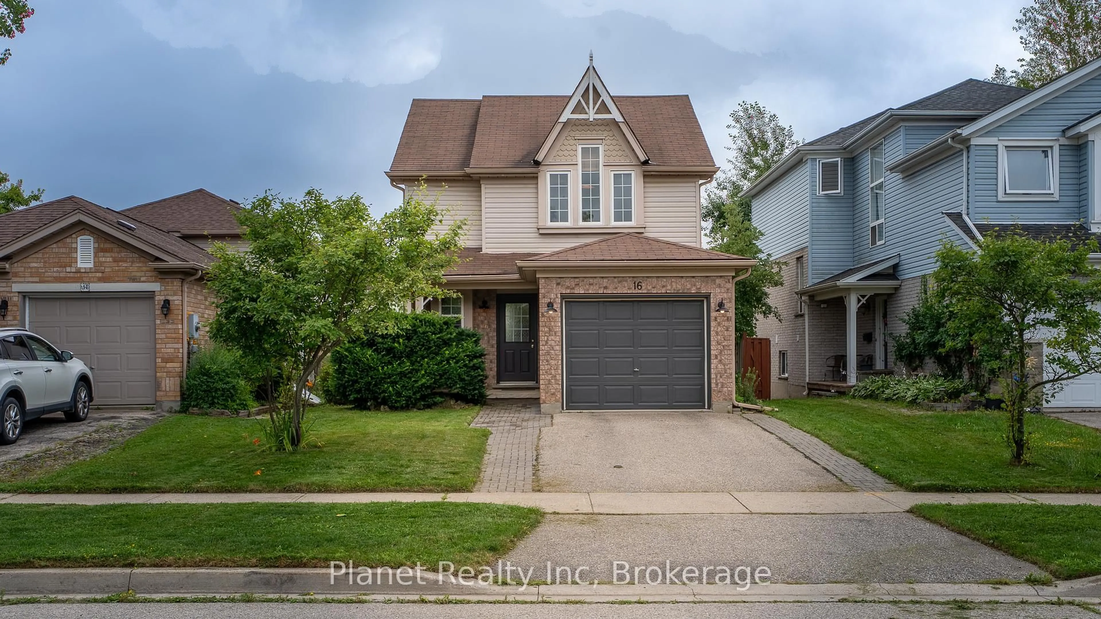 Home with brick exterior material, street for 16 Southcreek Tr, Guelph Ontario N1G 4Y8