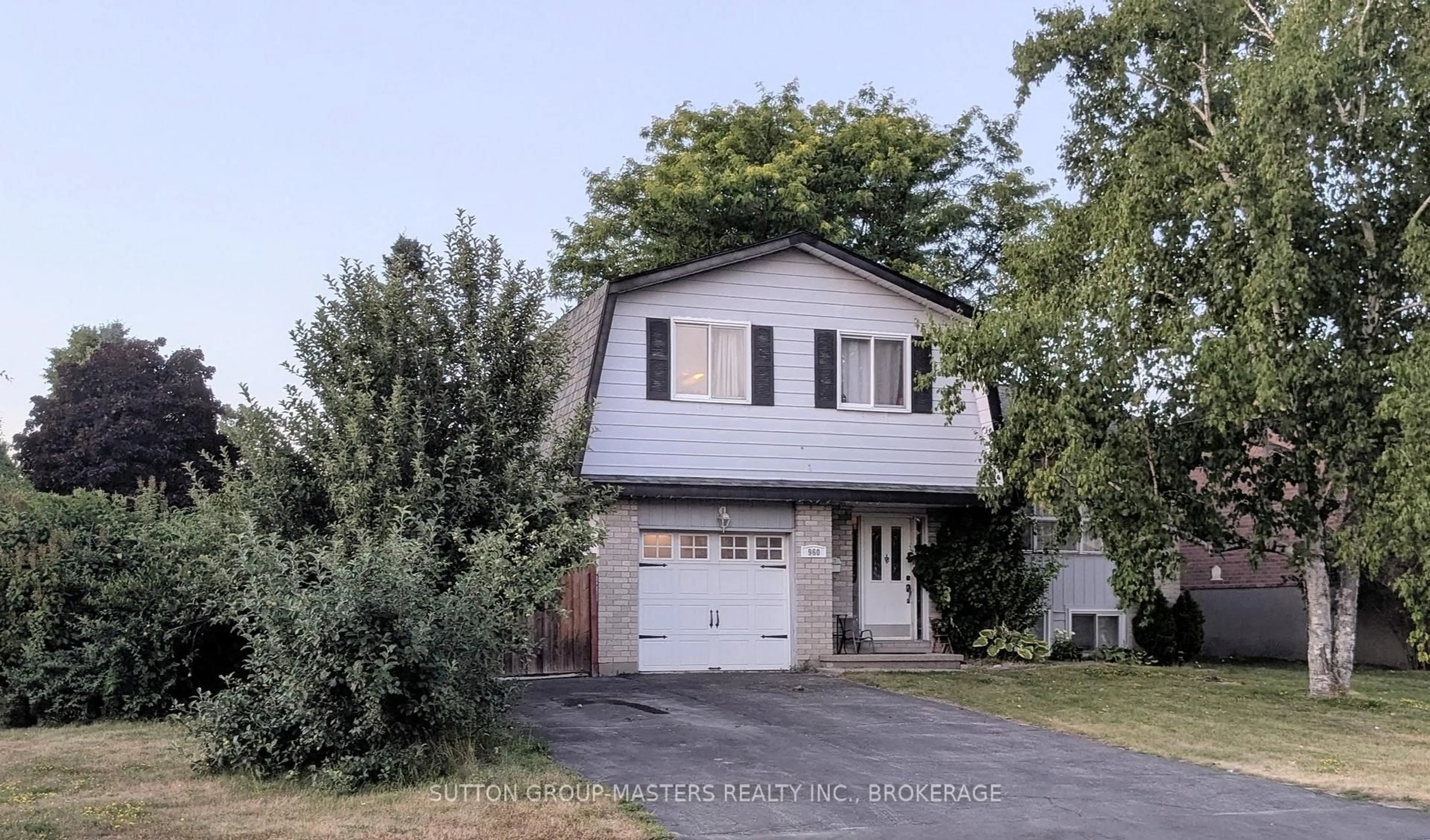 Home with vinyl exterior material, street for 960 Milford Dr, Kingston Ontario K7P 1N6
