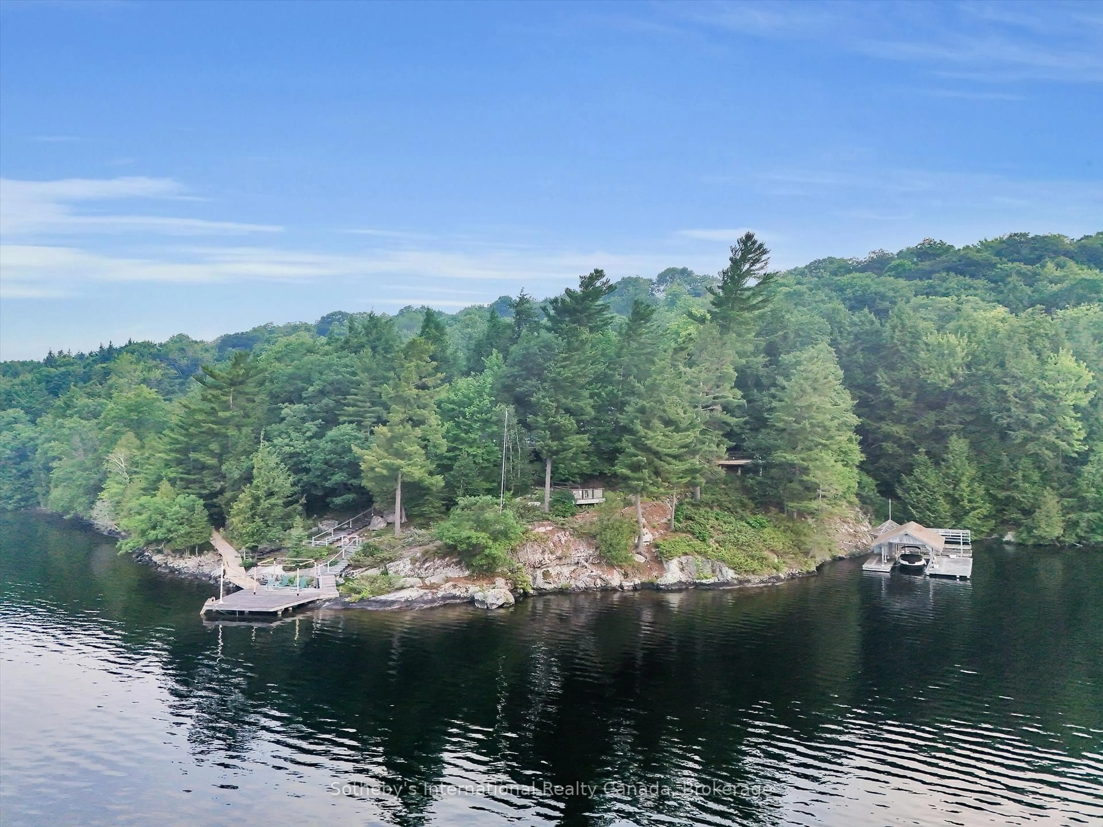A pic from outside/outdoor area/front of a property/back of a property/a pic from drone, water/lake/river/ocean view for 1080 Vanclieaf Dr, Lake of Bays Ontario P0B 1A0