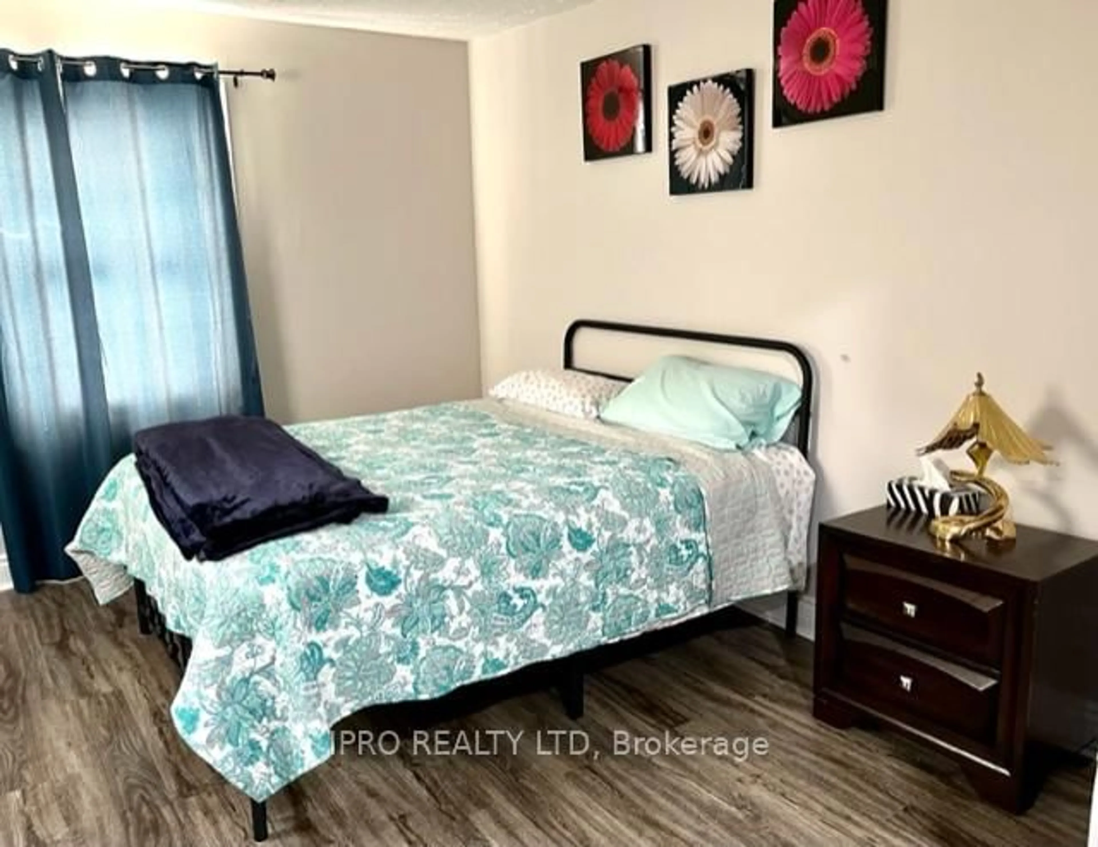 Bedroom with bed, wood/laminate floor for 6199 Arad St, Niagara Falls Ontario L2G 2Z4