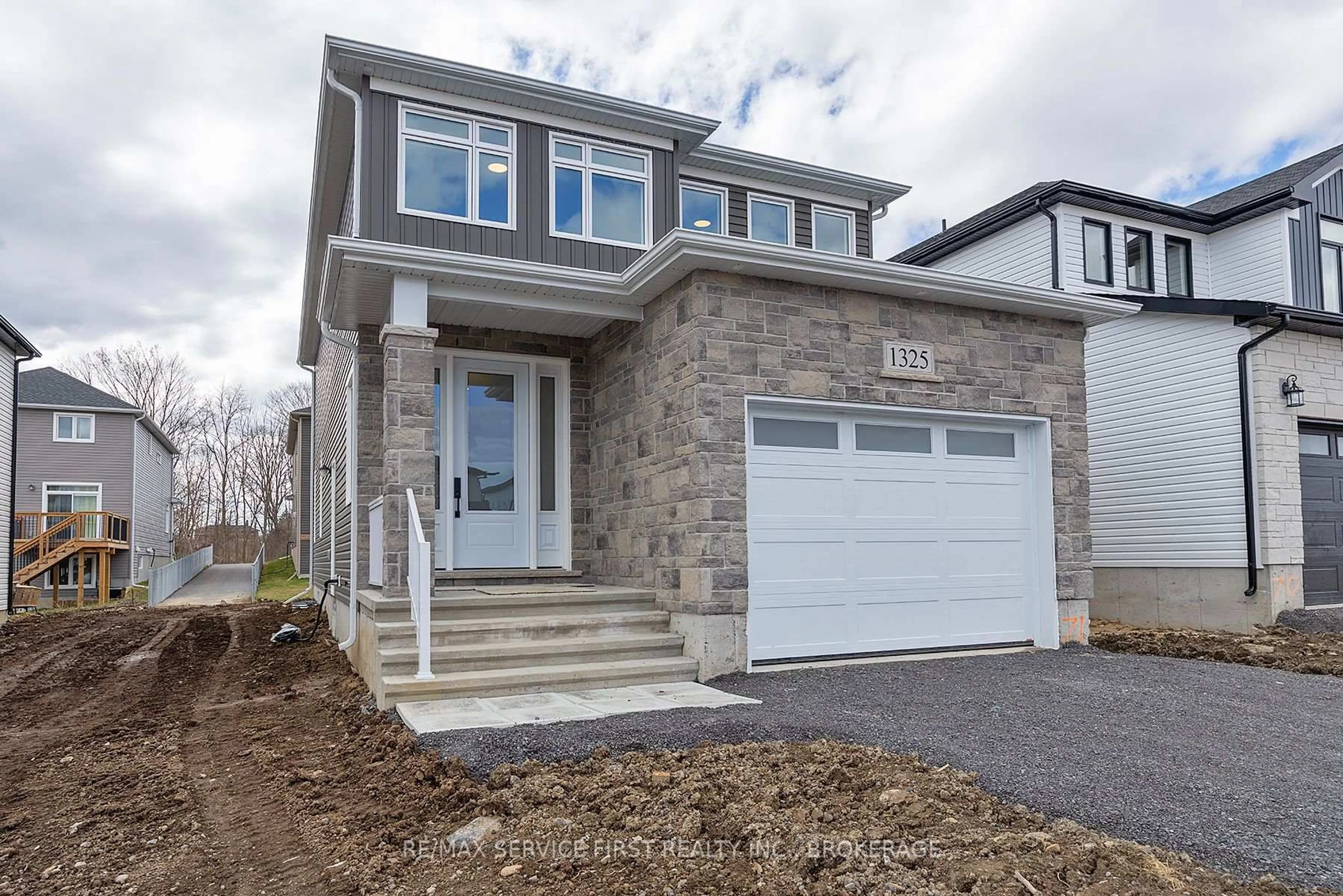 Home with brick exterior material, street for 1325 Turnbull Way #E71, Kingston Ontario K7P 0T6
