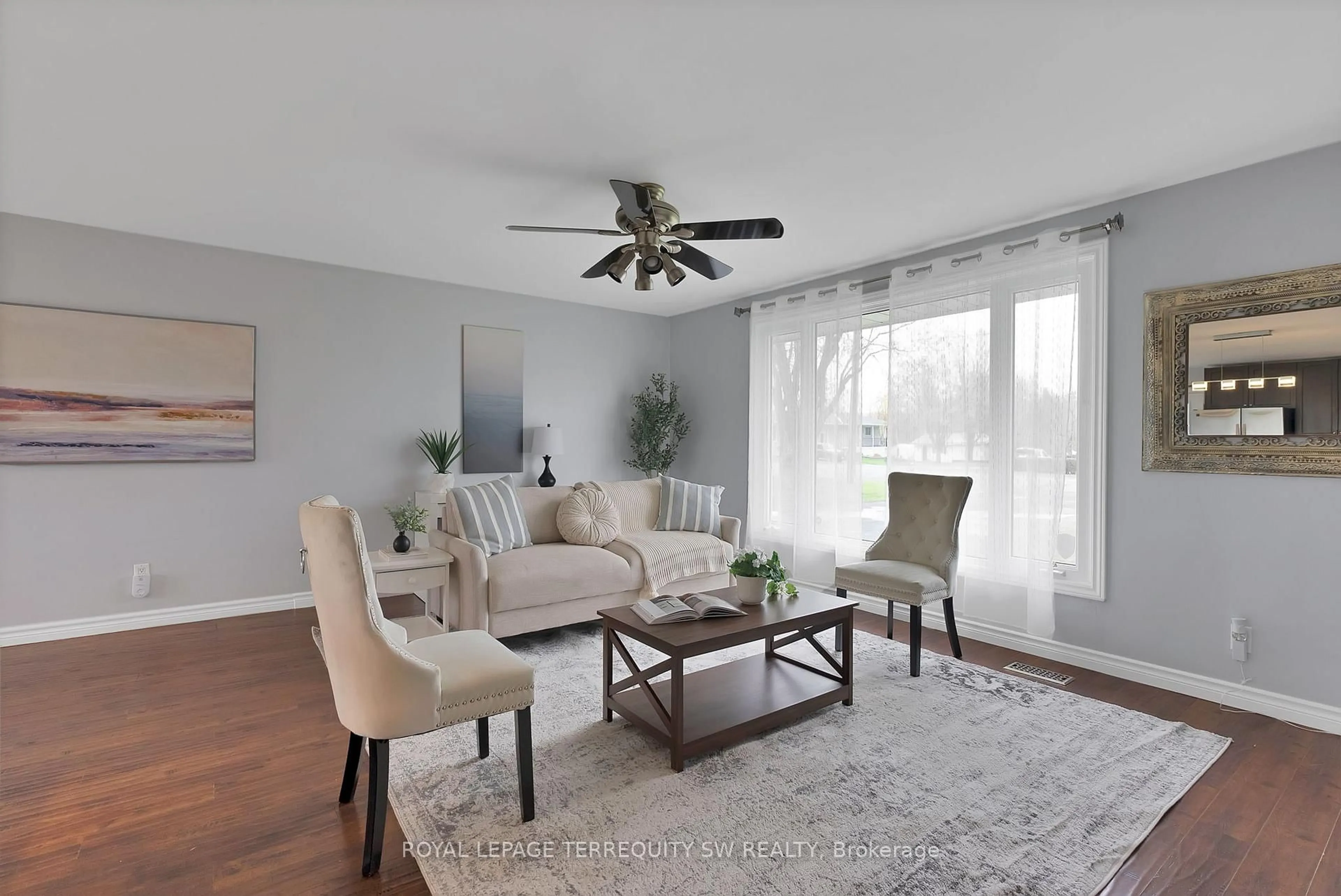 Living room with furniture, wood/laminate floor for 35 Queen St, Trent Hills Ontario K0L 1Y0