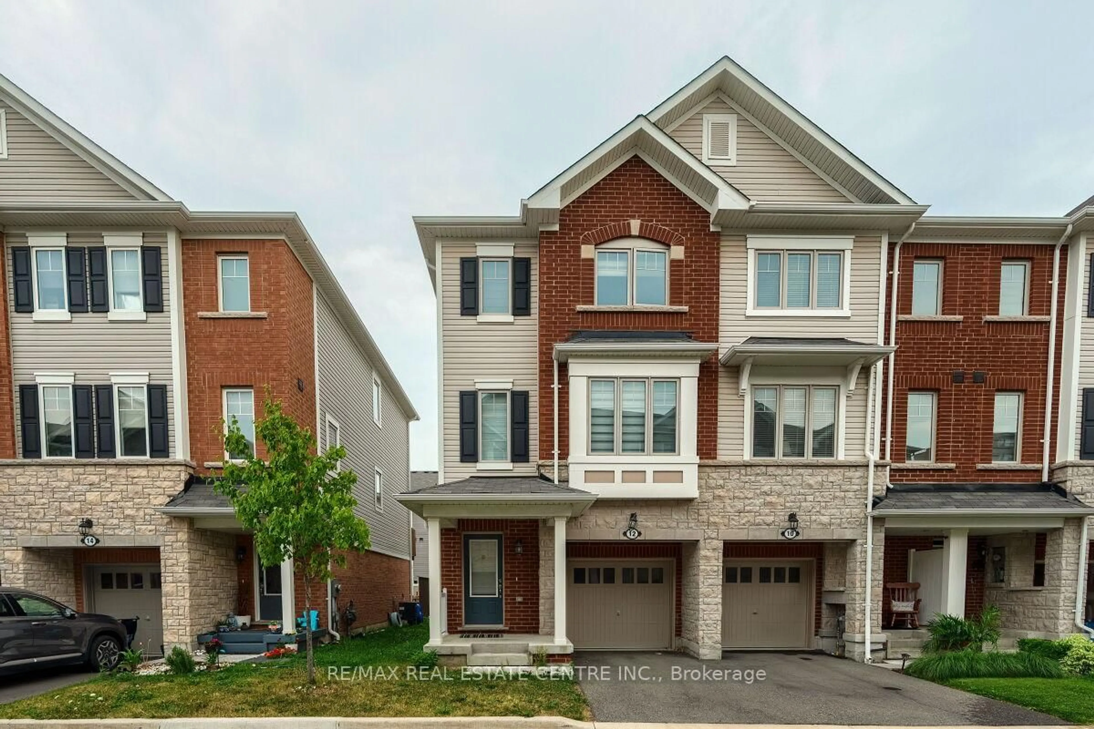 Home with brick exterior material, street for 12 Rapids Lane, Hamilton Ontario L8K 0A3