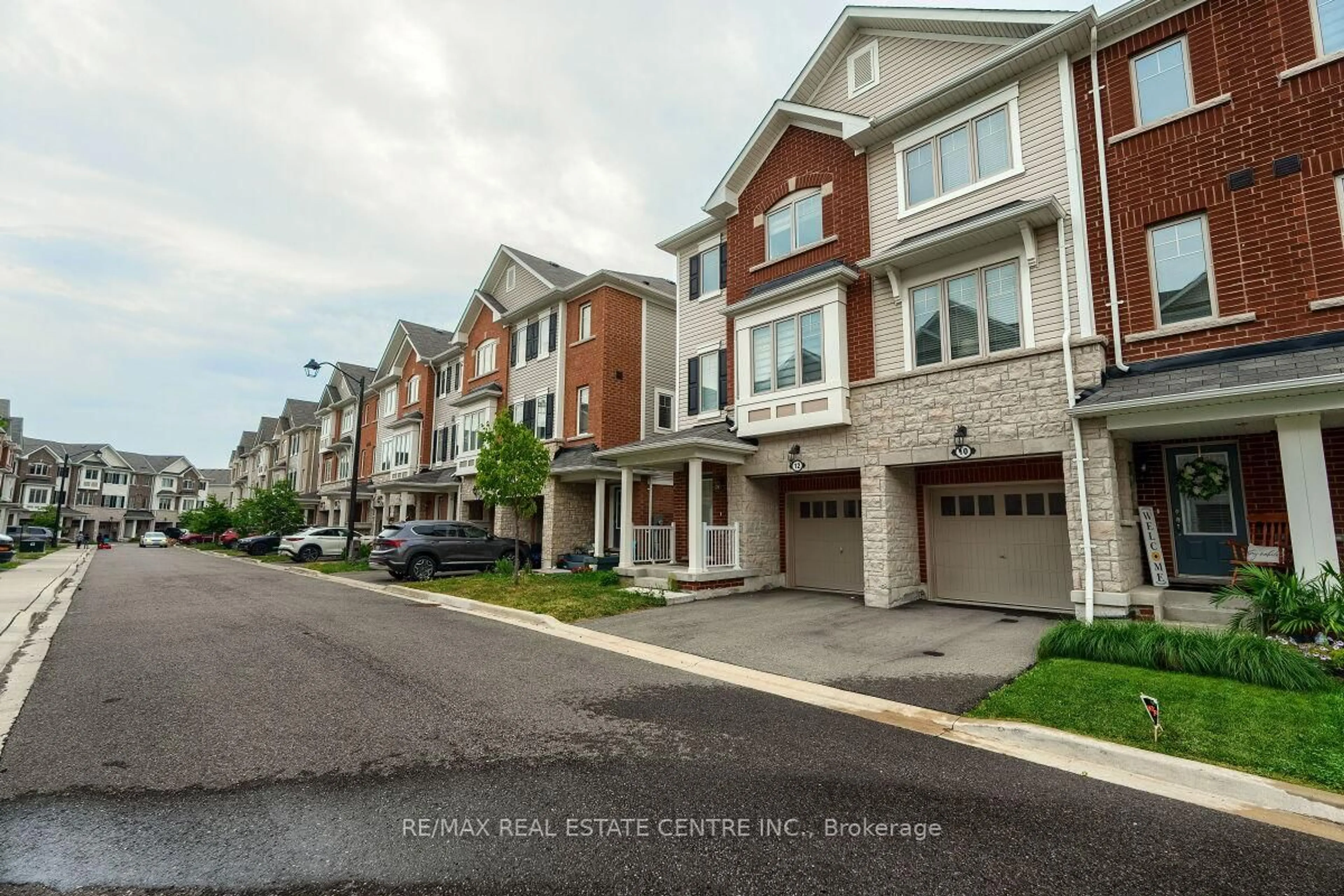 A pic from outside/outdoor area/front of a property/back of a property/a pic from drone, street for 12 Rapids Lane, Hamilton Ontario L8K 0A3
