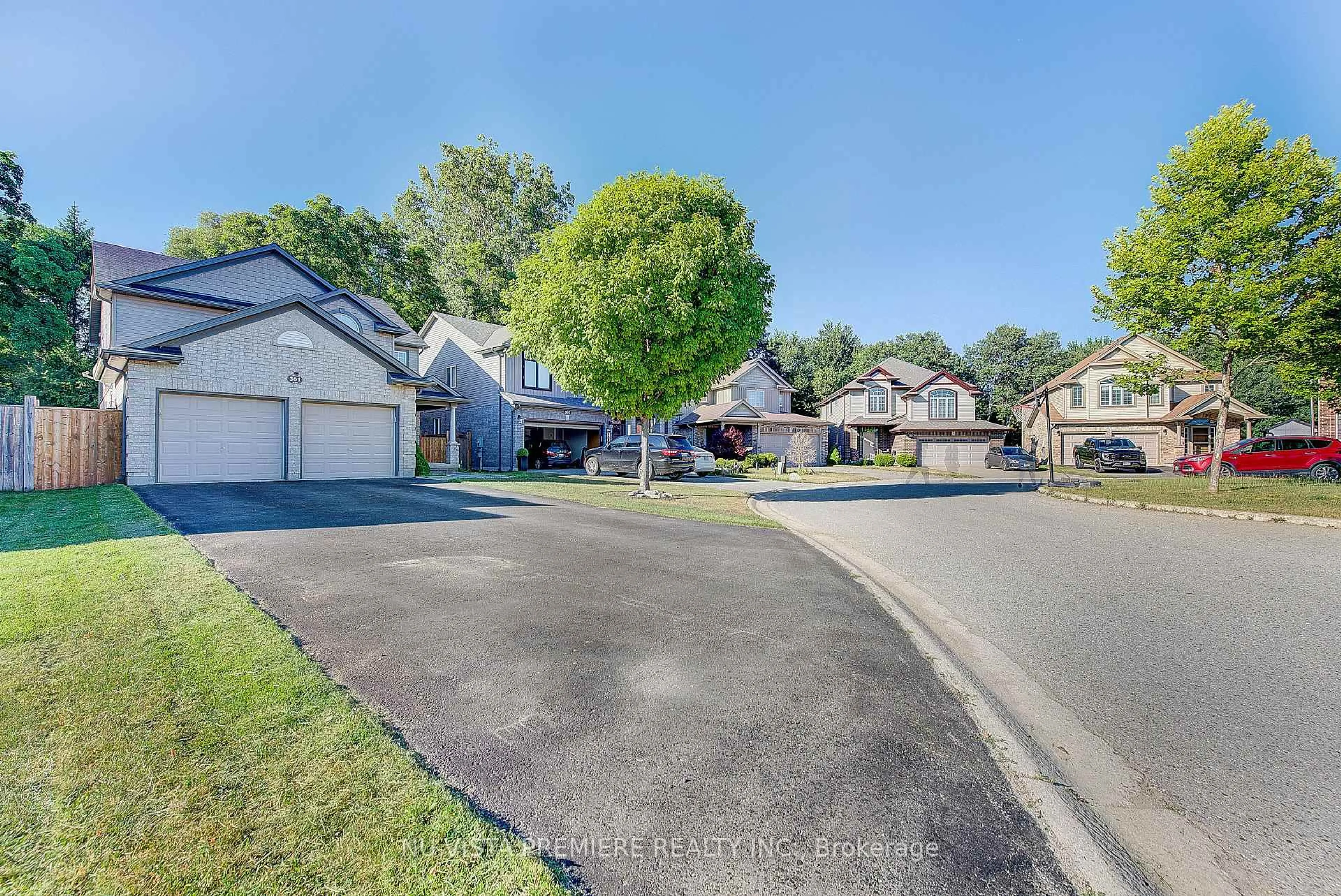 A pic from outside/outdoor area/front of a property/back of a property/a pic from drone, street for 301 Portrush Pl, London North Ontario N5X 0C2