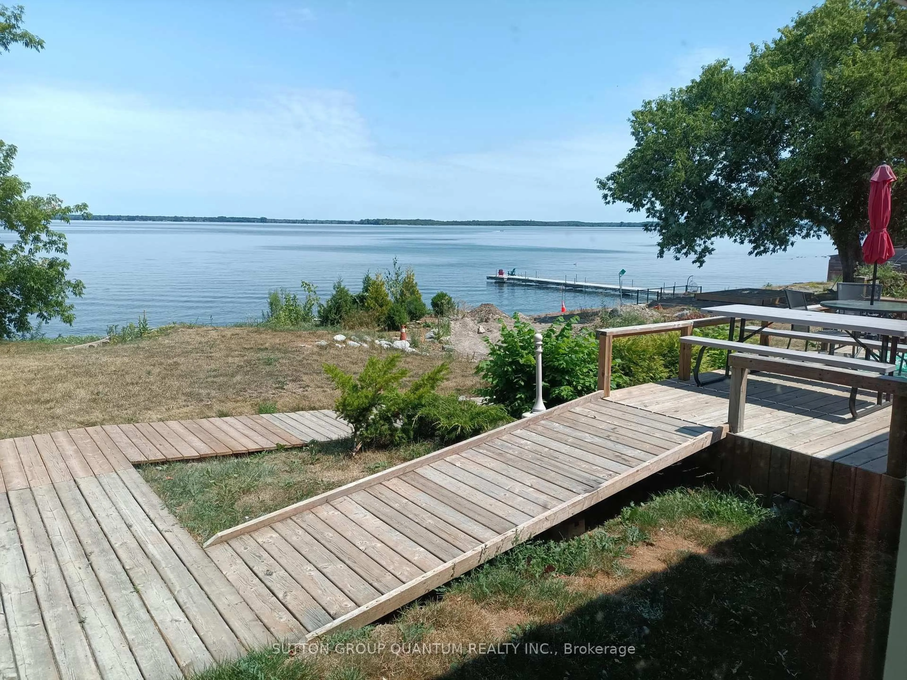 A pic from outside/outdoor area/front of a property/back of a property/a pic from drone, water/lake/river/ocean view for 47 Owen Lane, Prince Edward County Ontario K0K 1W0