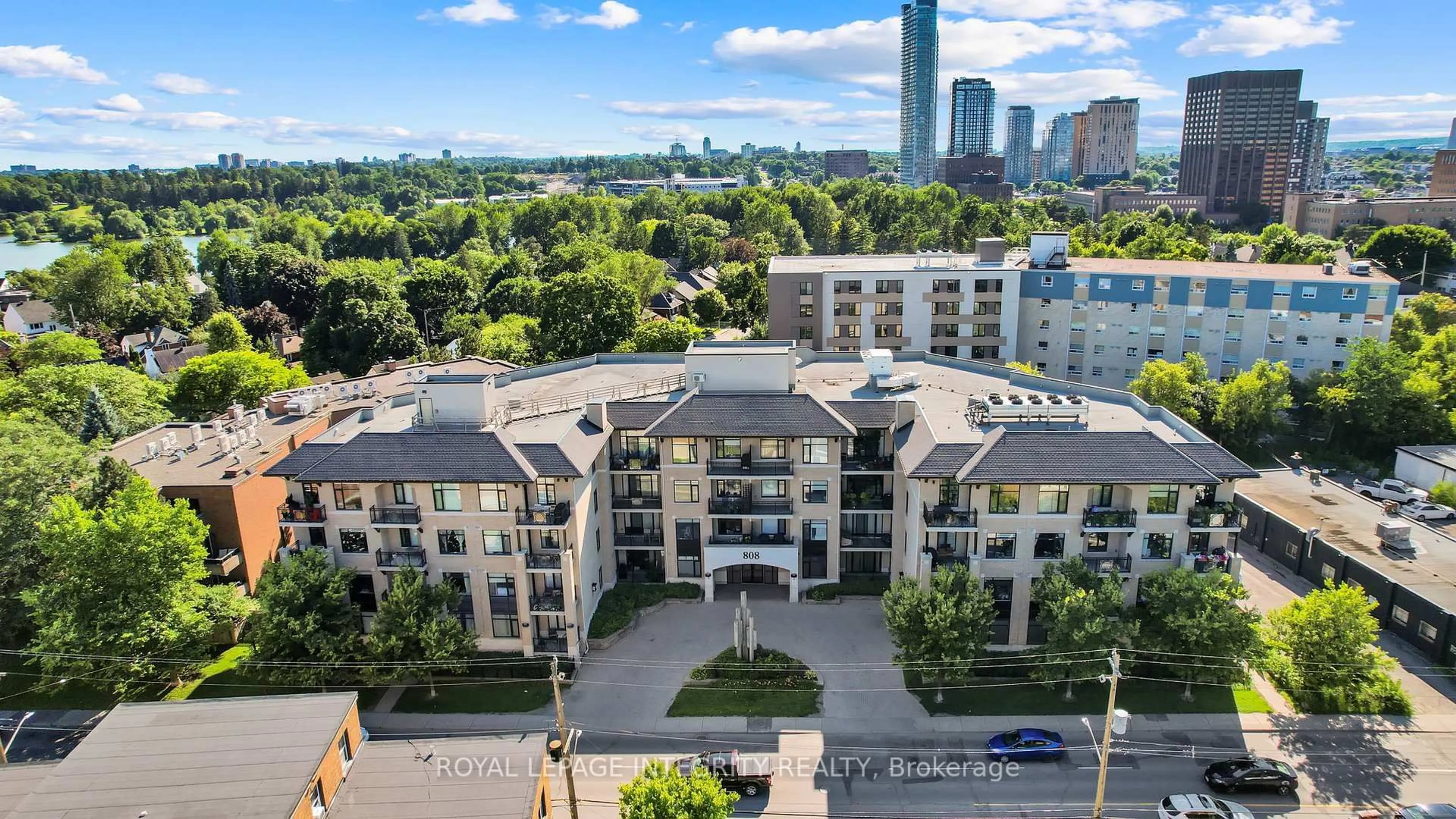 A pic from outside/outdoor area/front of a property/back of a property/a pic from drone, city buildings view from balcony for 808 Bronson Ave #114, Ottawa Ontario K1S 5A4