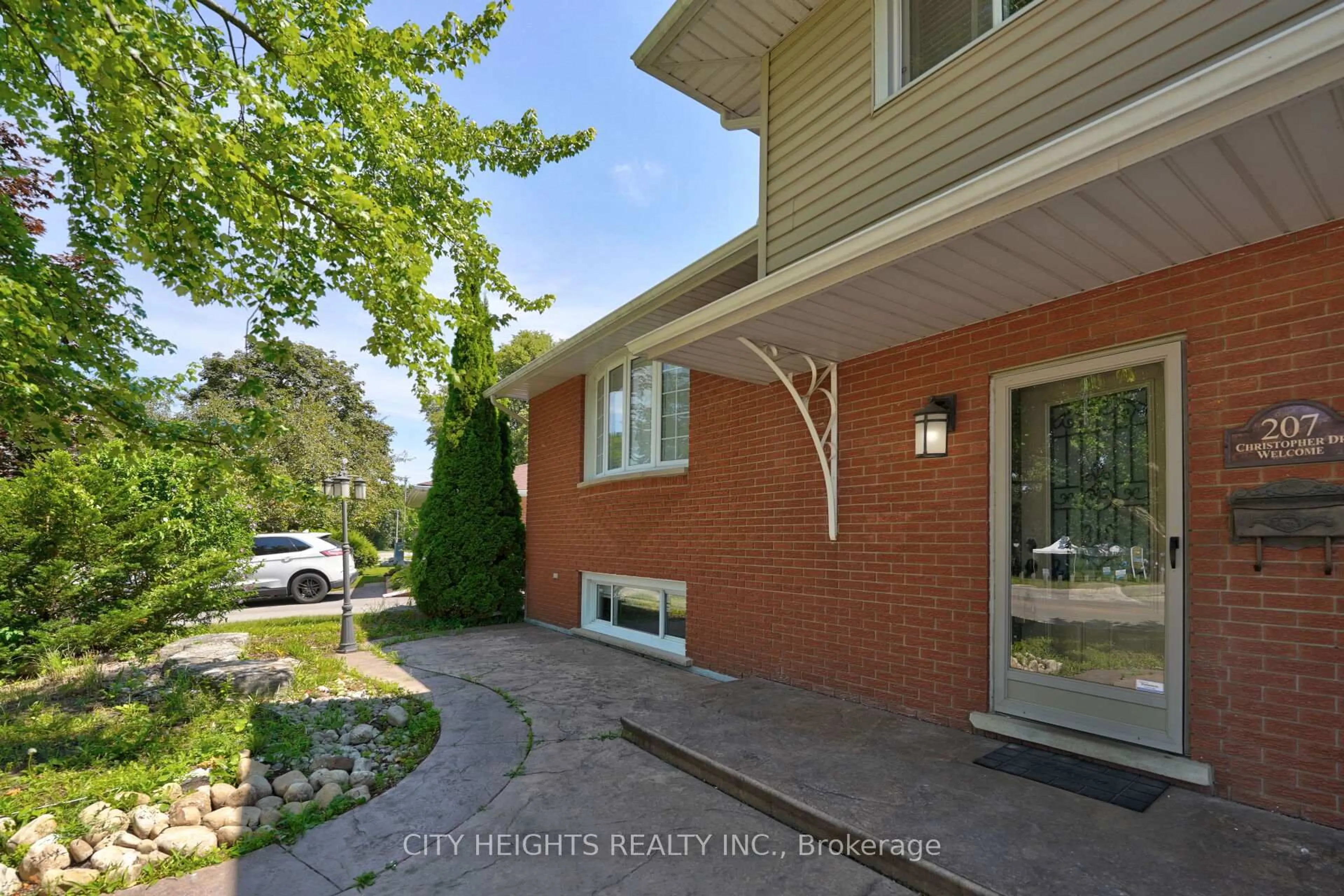 Home with brick exterior material, street for 207 Christopher Dr, Cambridge Ontario N1R 4S6