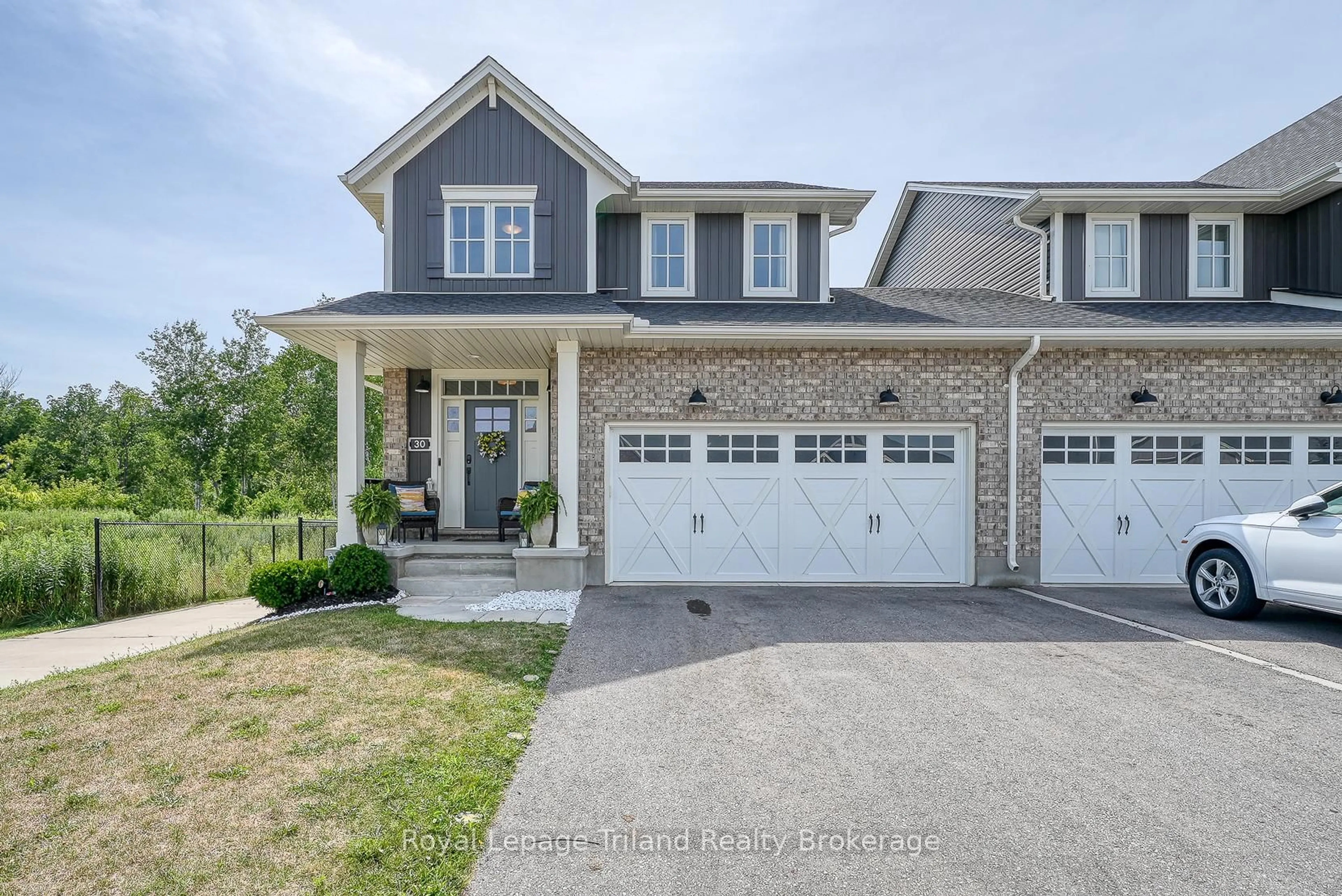 Home with brick exterior material, street for 30 Livingston Dr, Tillsonburg Ontario N4G 0J3
