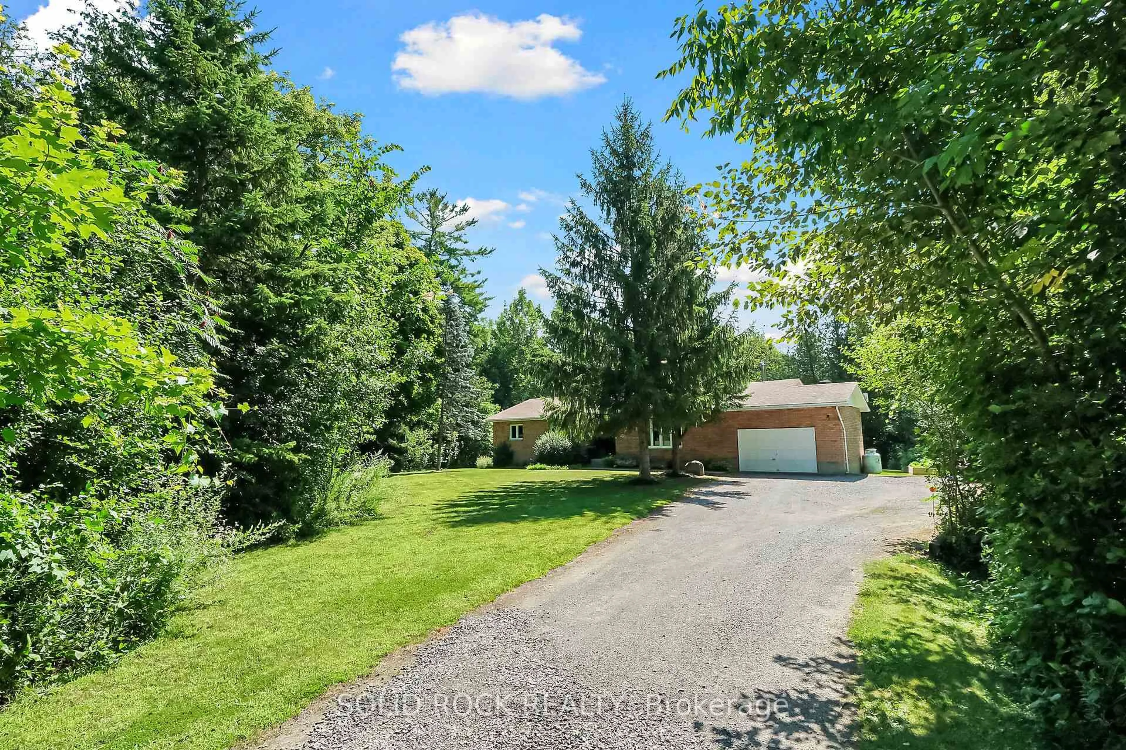 A pic from outside/outdoor area/front of a property/back of a property/a pic from drone, unknown for 209 Deerwood Dr, Kinburn Ontario K0A 2H0