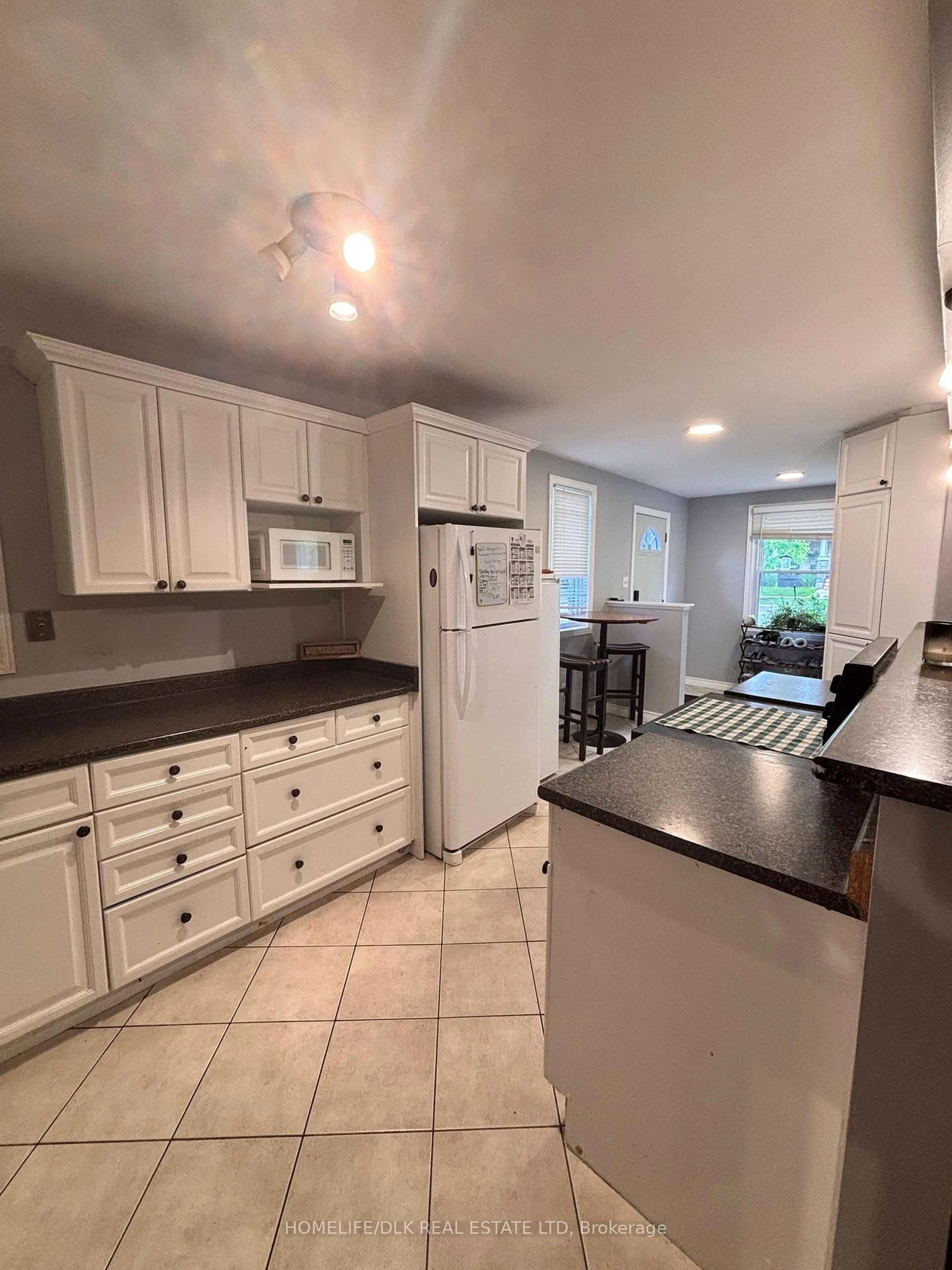 Open concept kitchen, ceramic/tile floor for 644 Grosvenor St, London East Ontario N5Y 3T4