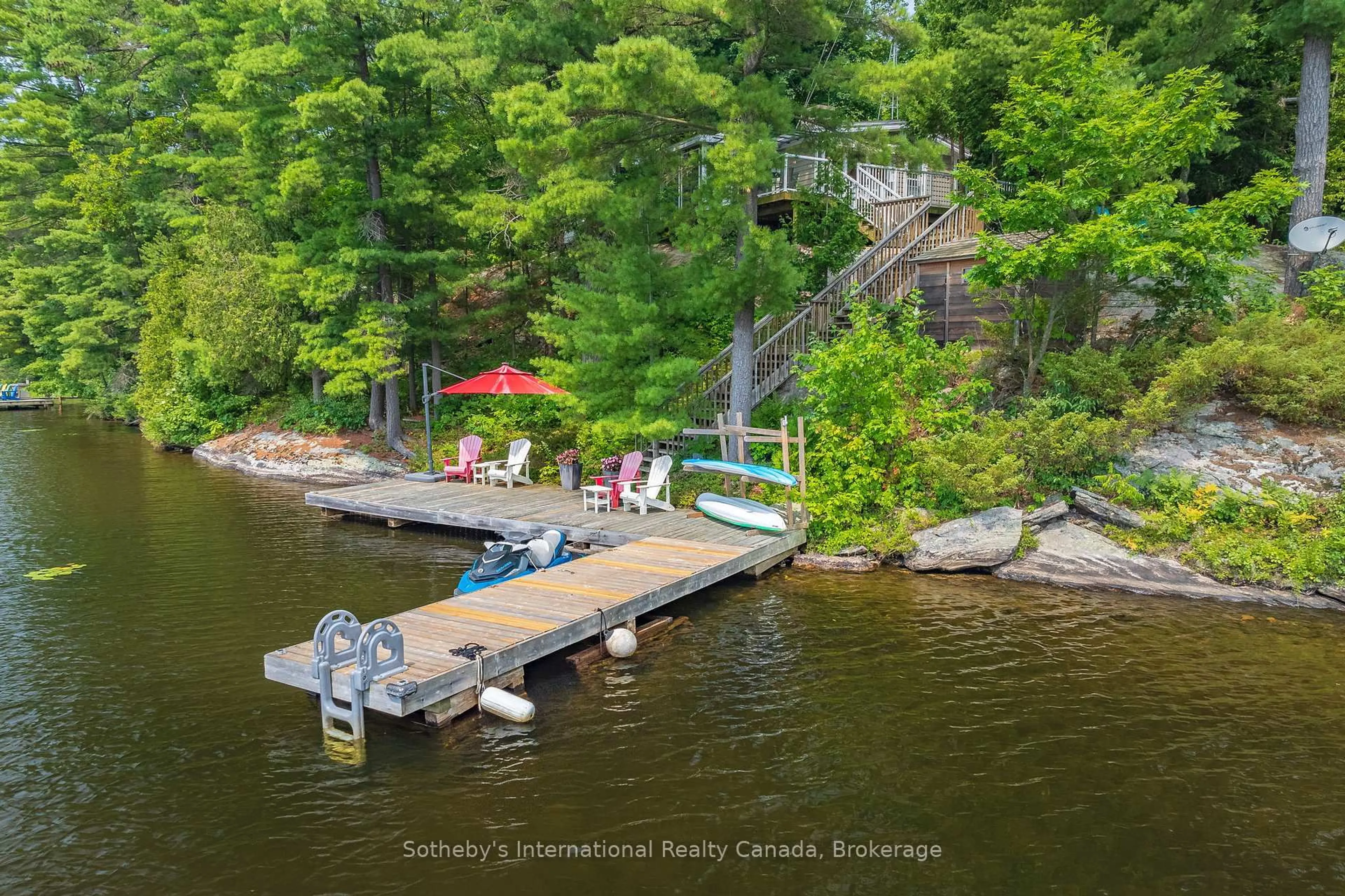 A pic from outside/outdoor area/front of a property/back of a property/a pic from drone, water/lake/river/ocean view for 1032 Sunset Bay Rd, Gravenhurst Ontario P1P 1R2