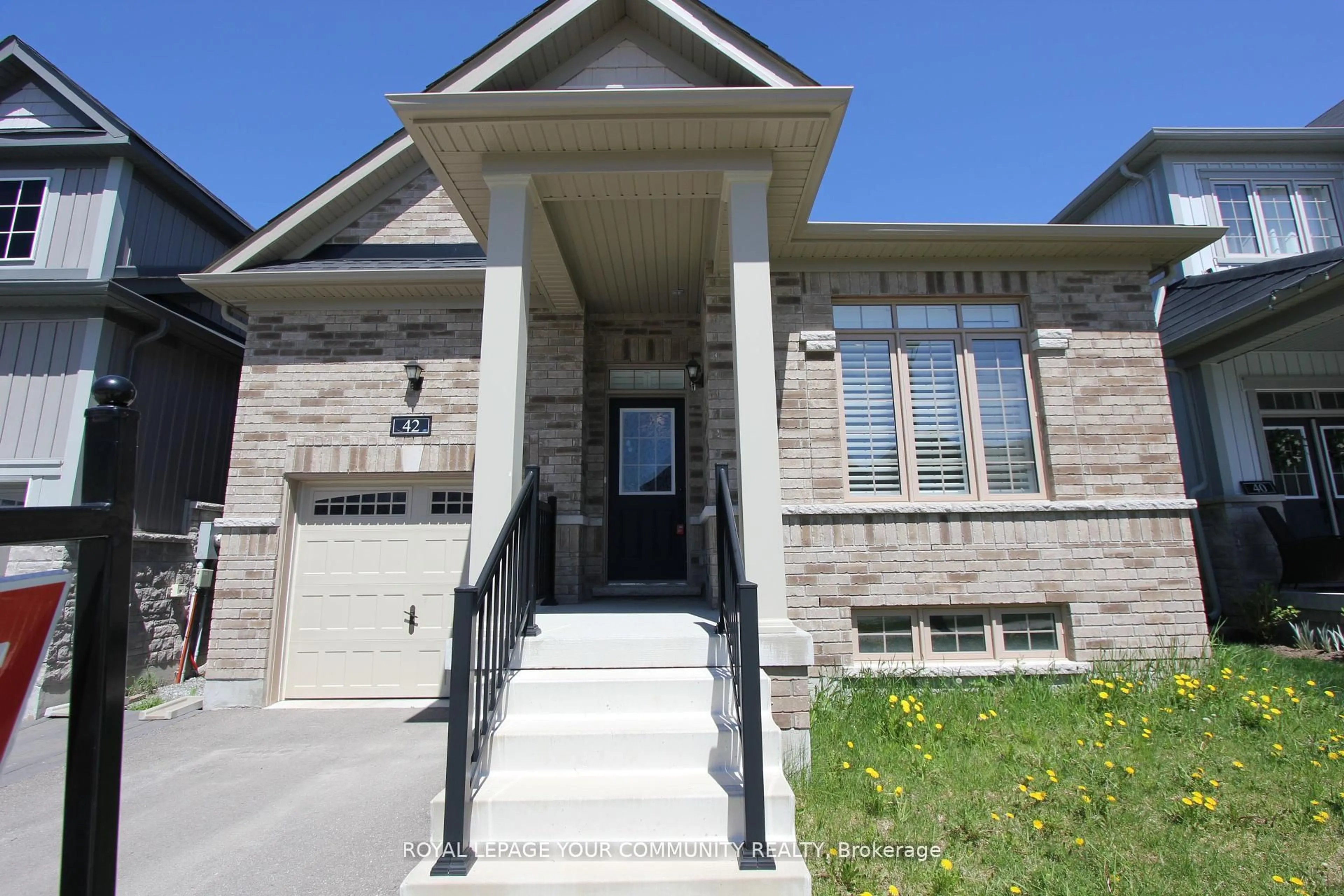 Home with brick exterior material, street for 42 Northhill Ave, Cavan Monaghan Ontario L4A 1G0