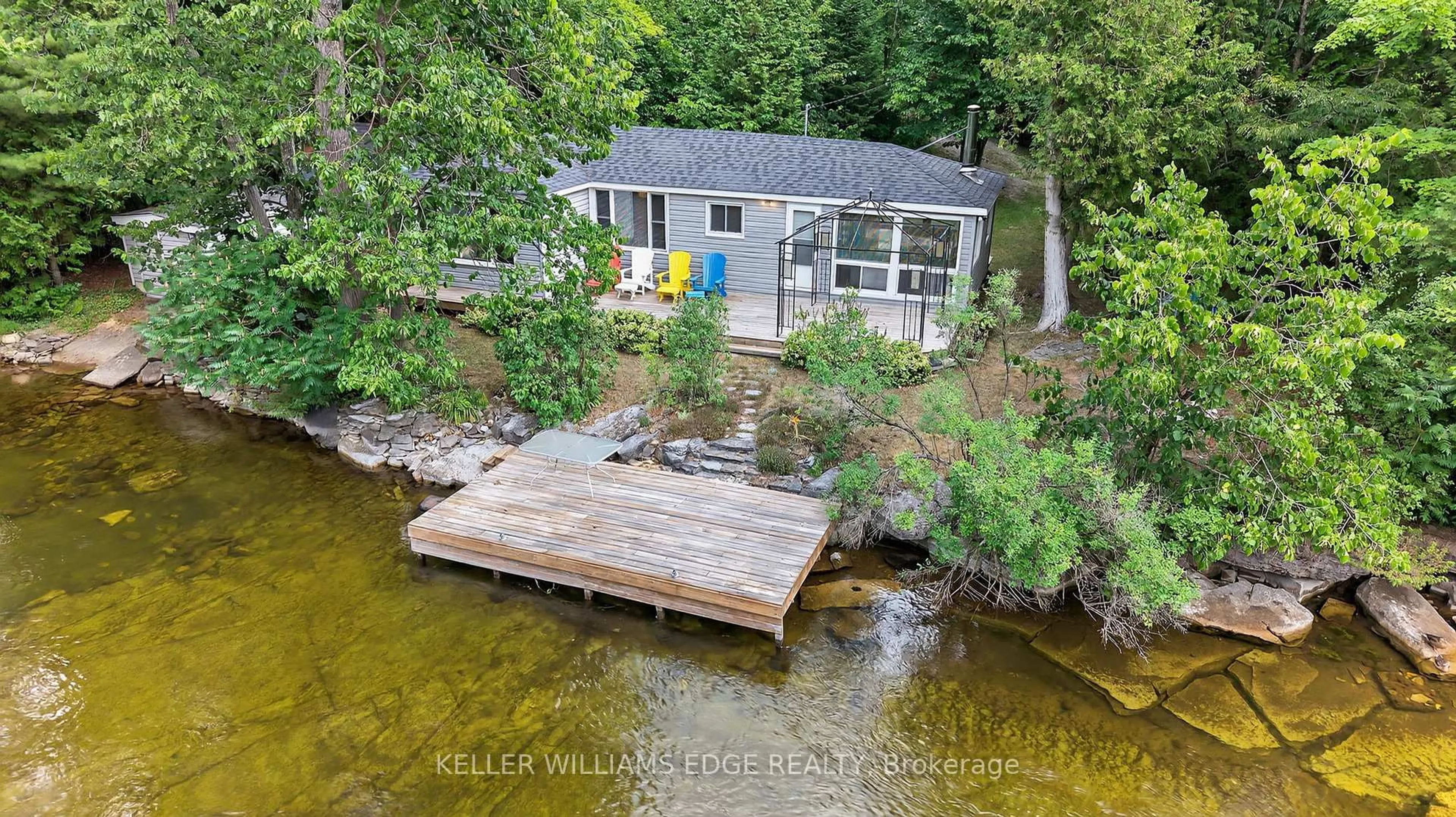 A pic from outside/outdoor area/front of a property/back of a property/a pic from drone, water/lake/river/ocean view for 92 Shadow Lake Rd 28 Rd, Kawartha Lakes Ontario K0M 1K0