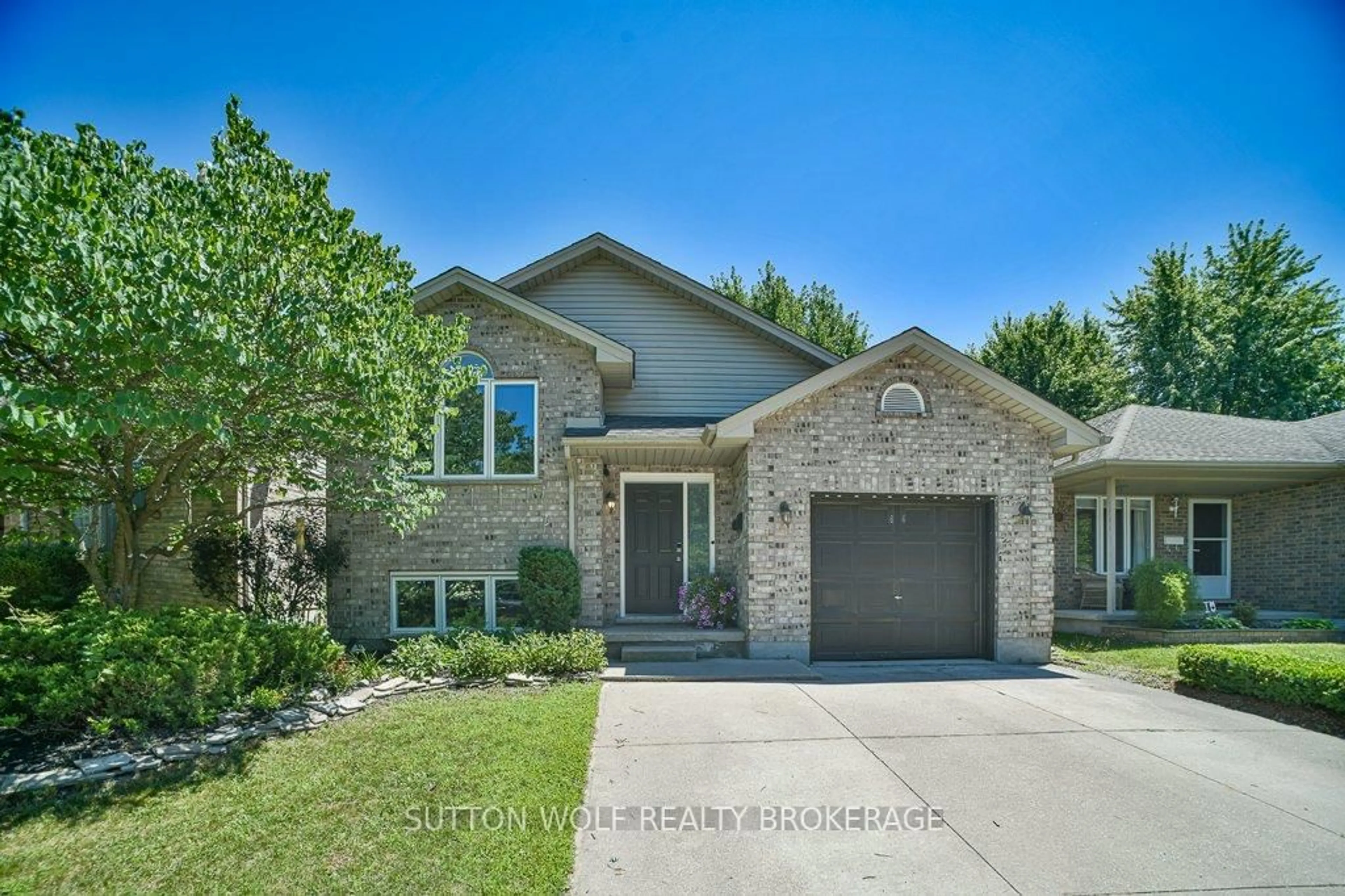 Home with brick exterior material, street for 64 Hickory Blvd, Strathroy-Caradoc Ontario N7G 4E9
