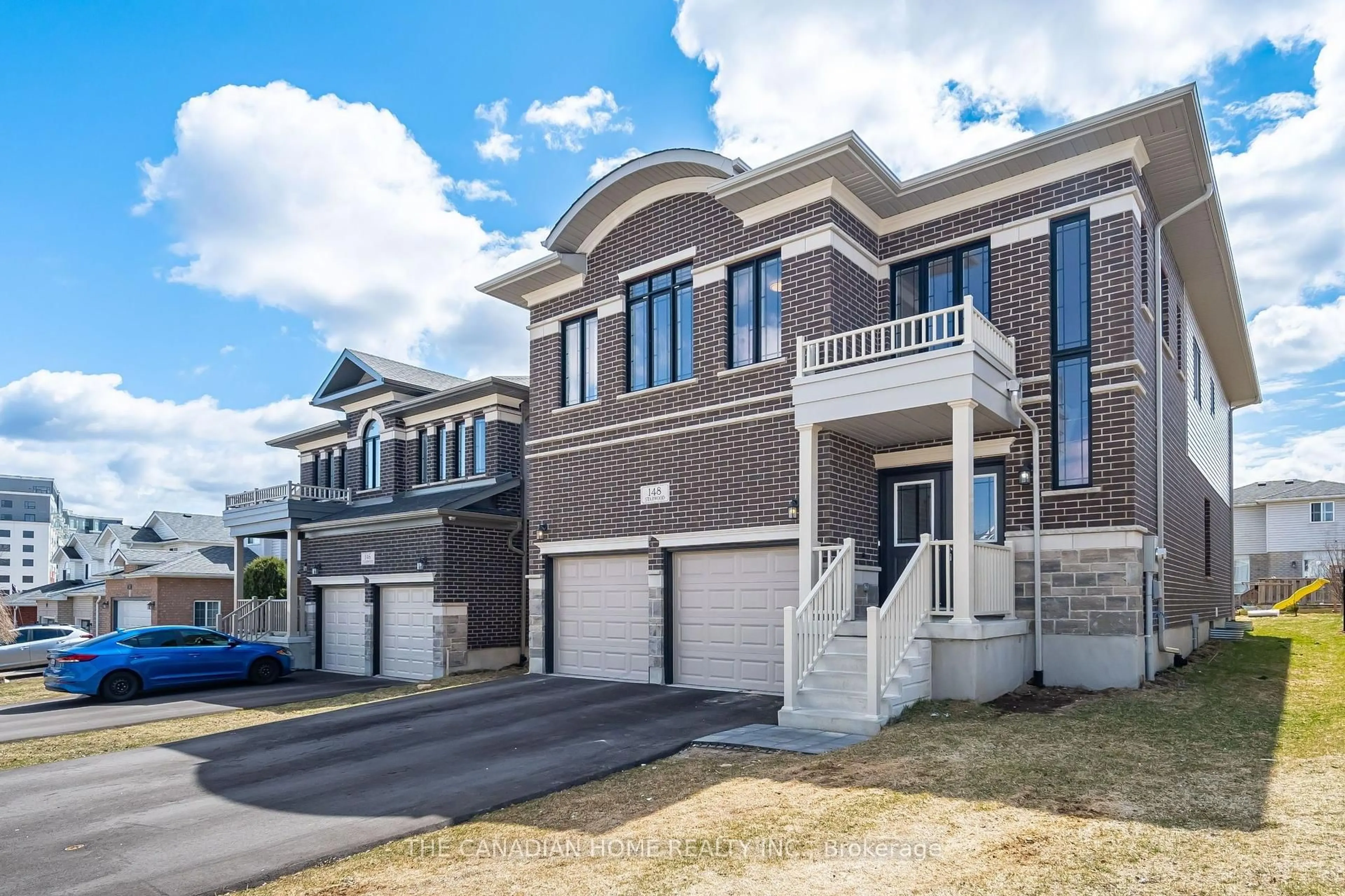 Home with brick exterior material, street for 148 STARWOOD Dr, Guelph Ontario N1E 7G7