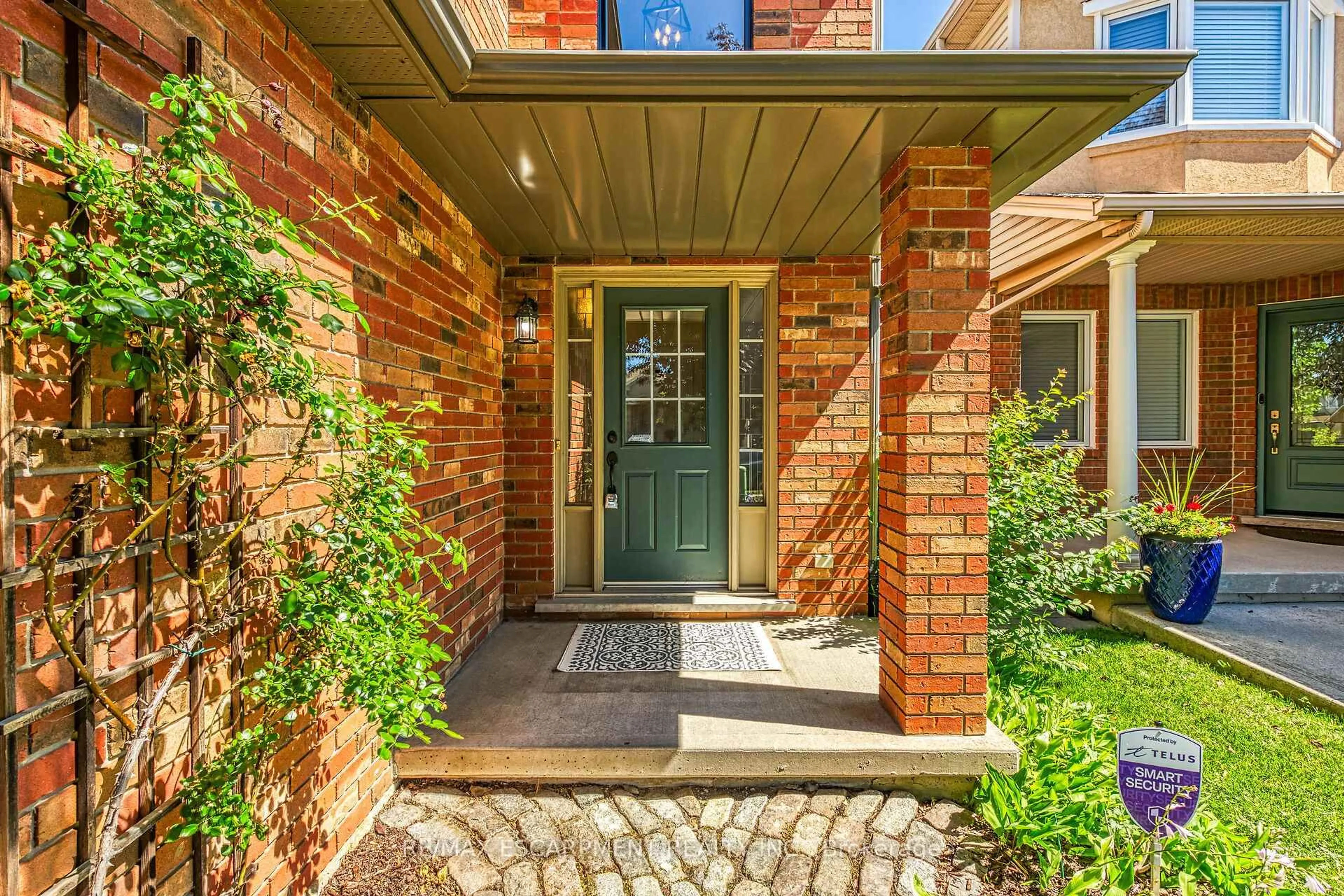 Home with brick exterior material, street for 239 HEPBURN Cres, Hamilton Ontario L9C 7T3