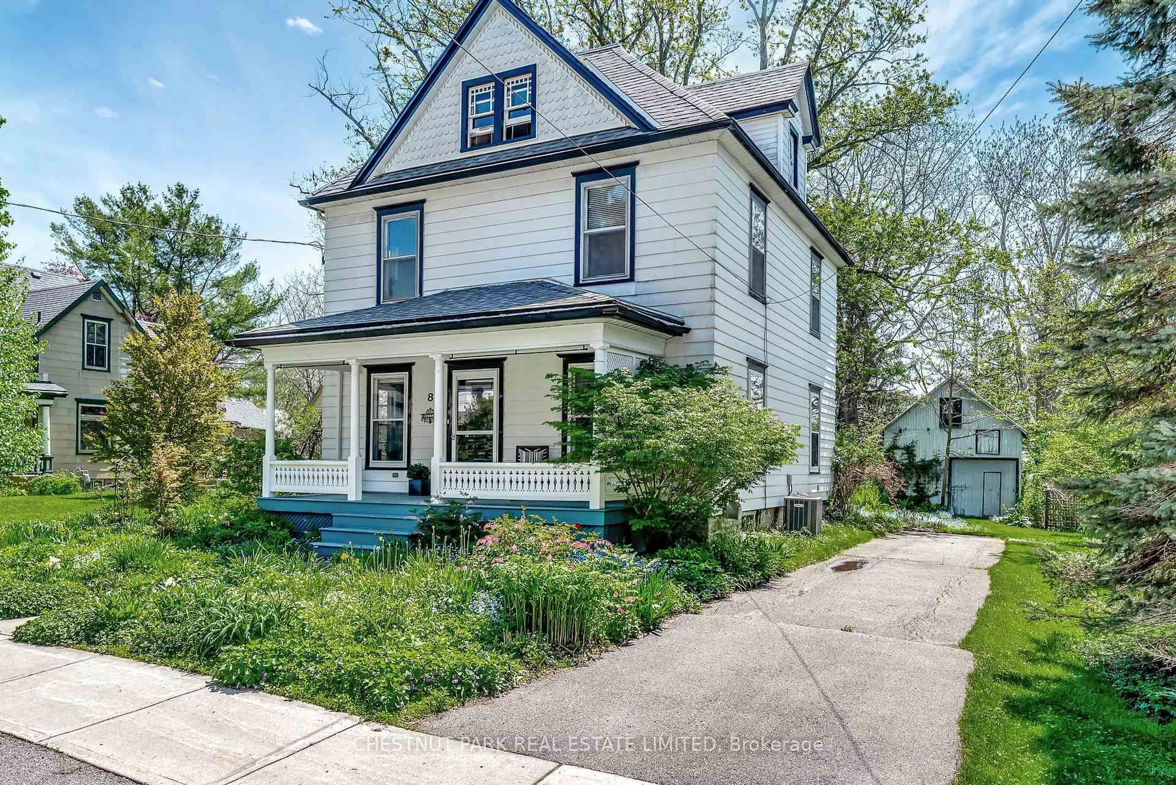 Home with vinyl exterior material, street for 8 Queen St, Prince Edward County Ontario K0K 2T0