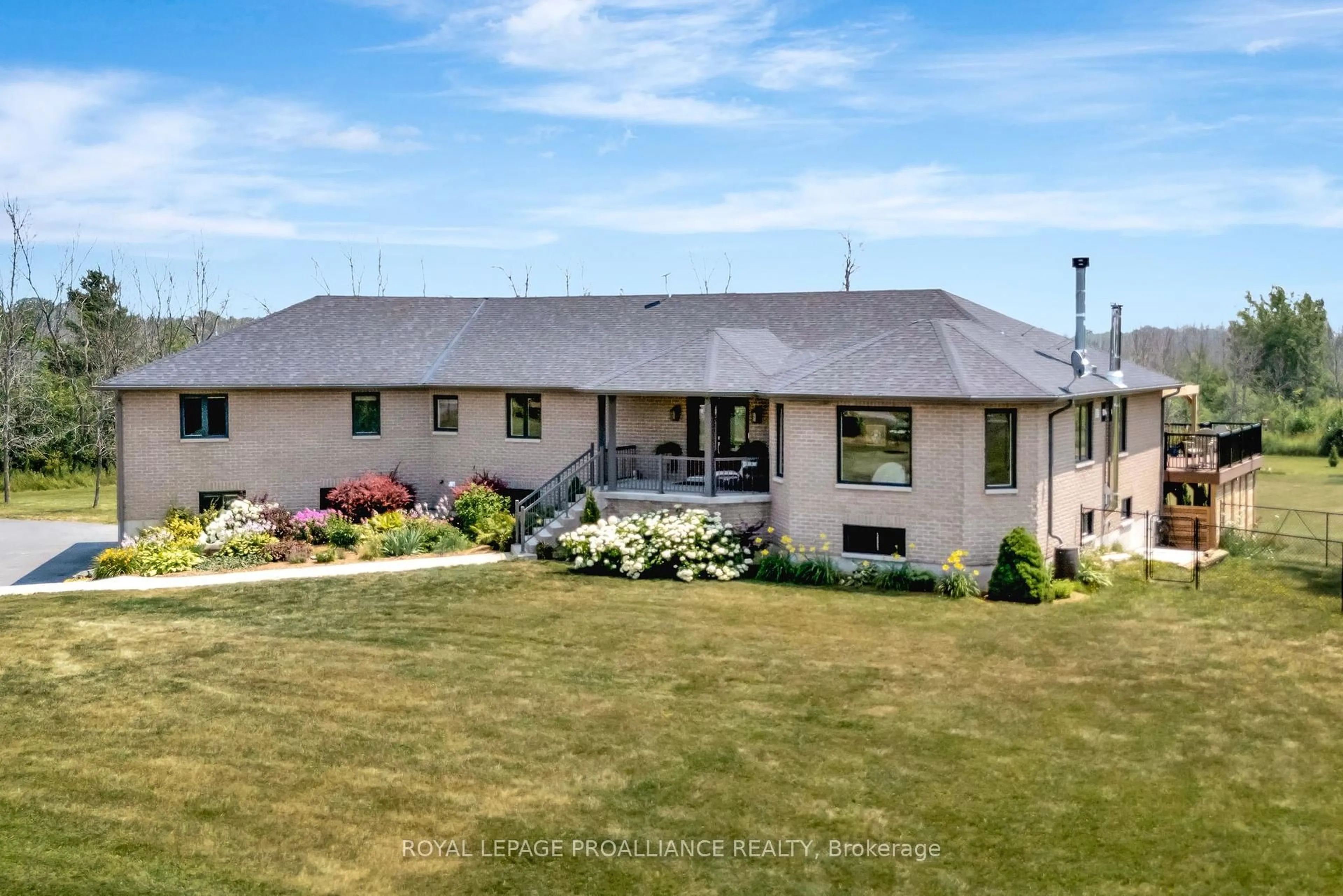 A pic from outside/outdoor area/front of a property/back of a property/a pic from drone, unknown for 6282 County Road 2, Bissett Creek Ontario K0H 2H0