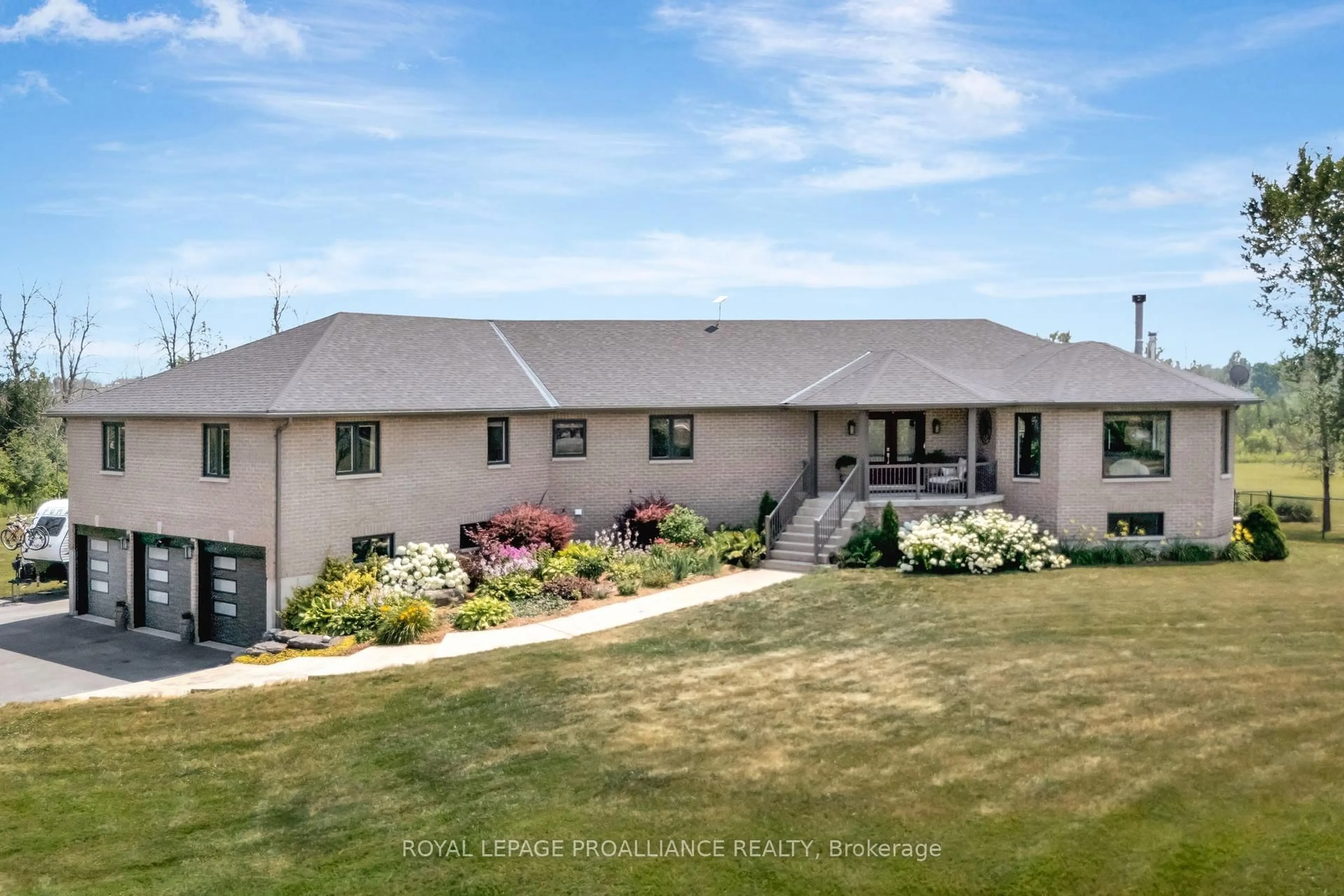 A pic from outside/outdoor area/front of a property/back of a property/a pic from drone, unknown for 6282 County Road 2, Bissett Creek Ontario K0H 2H0