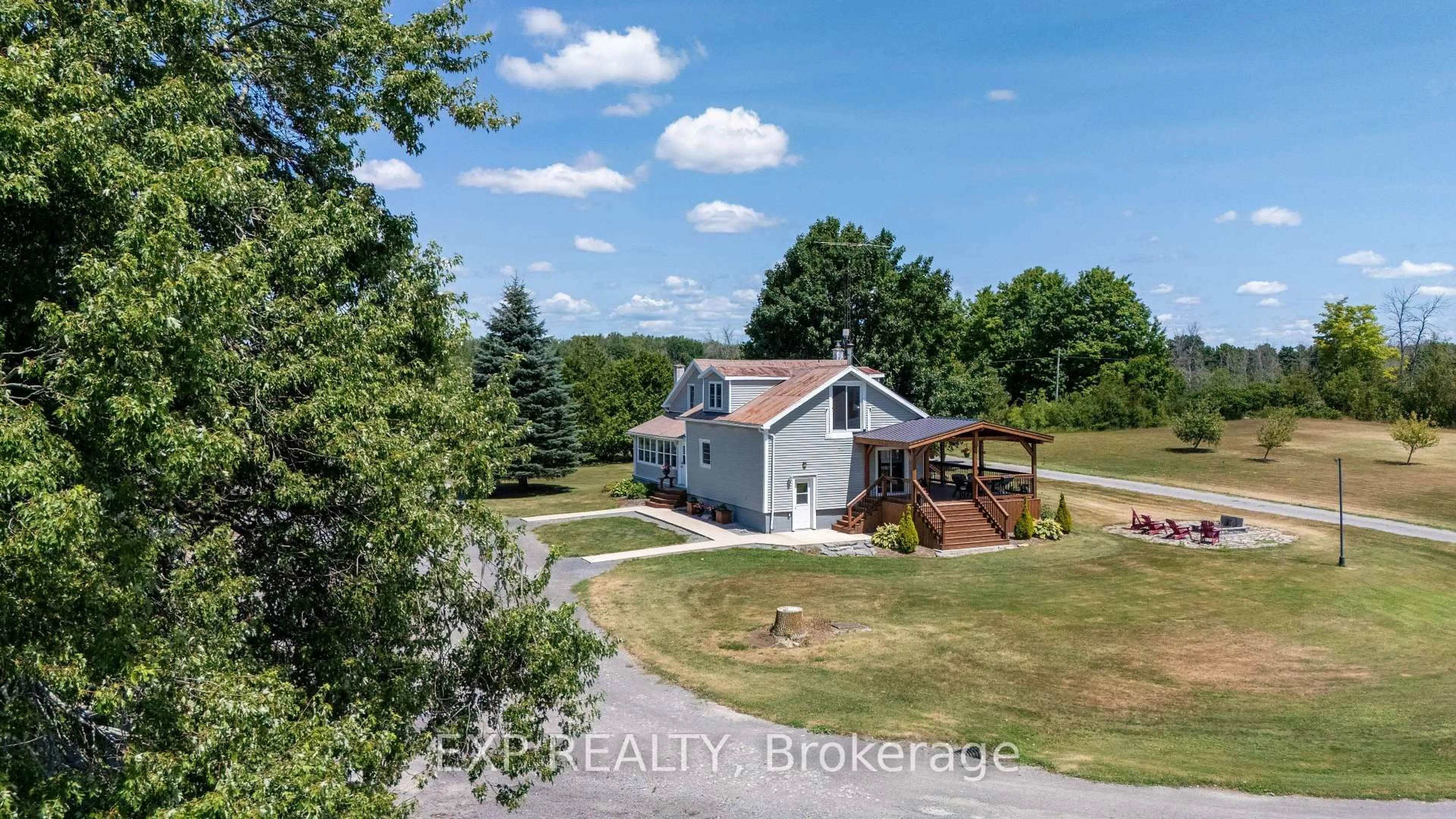 A pic from outside/outdoor area/front of a property/back of a property/a pic from drone, water/lake/river/ocean view for 1754 County Rd 12 Rd, Greater Napanee Ontario K0K 2W0