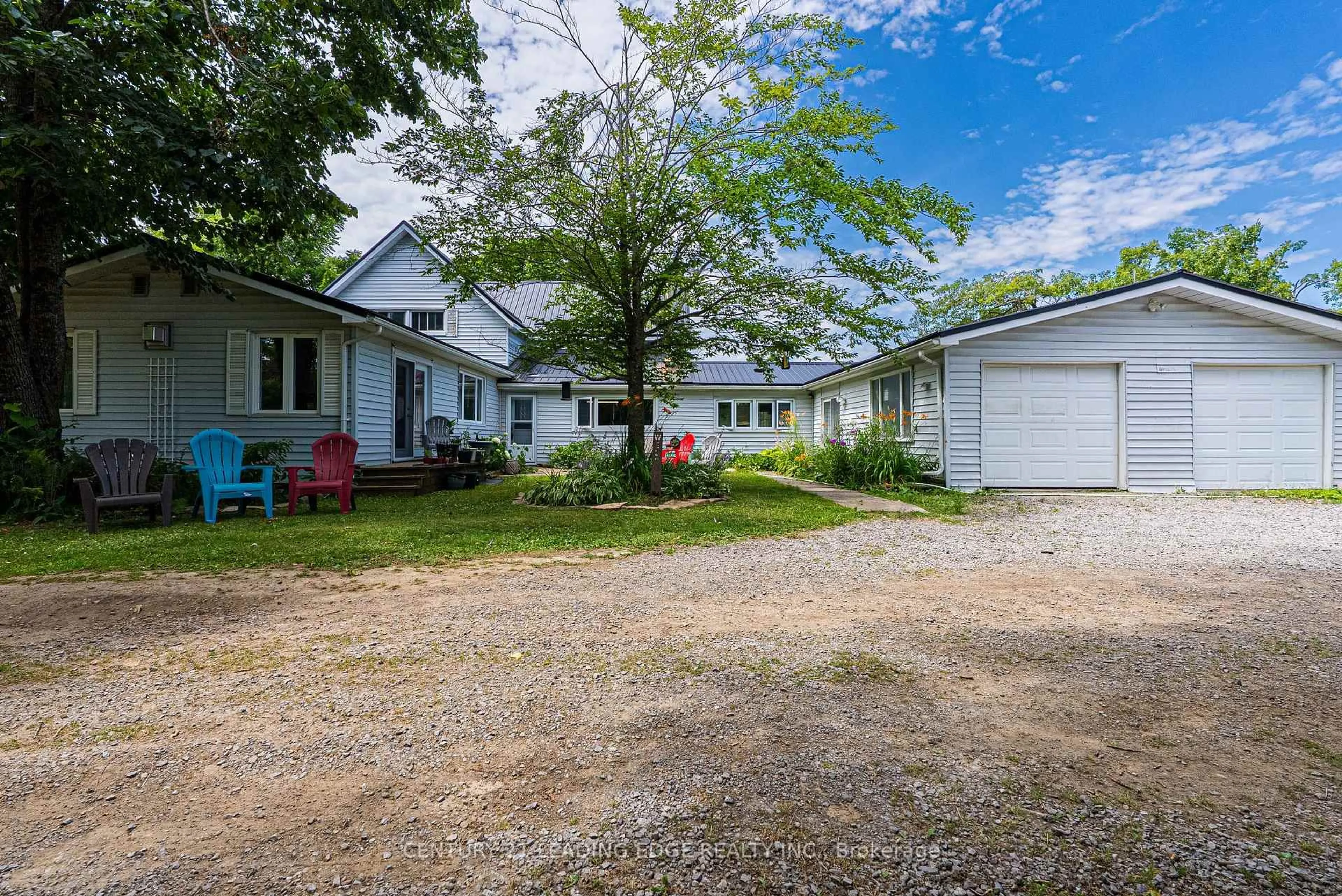 A pic from outside/outdoor area/front of a property/back of a property/a pic from drone, street for 4077 Monck Rd, Kawartha Lakes Ontario K0M 1K0