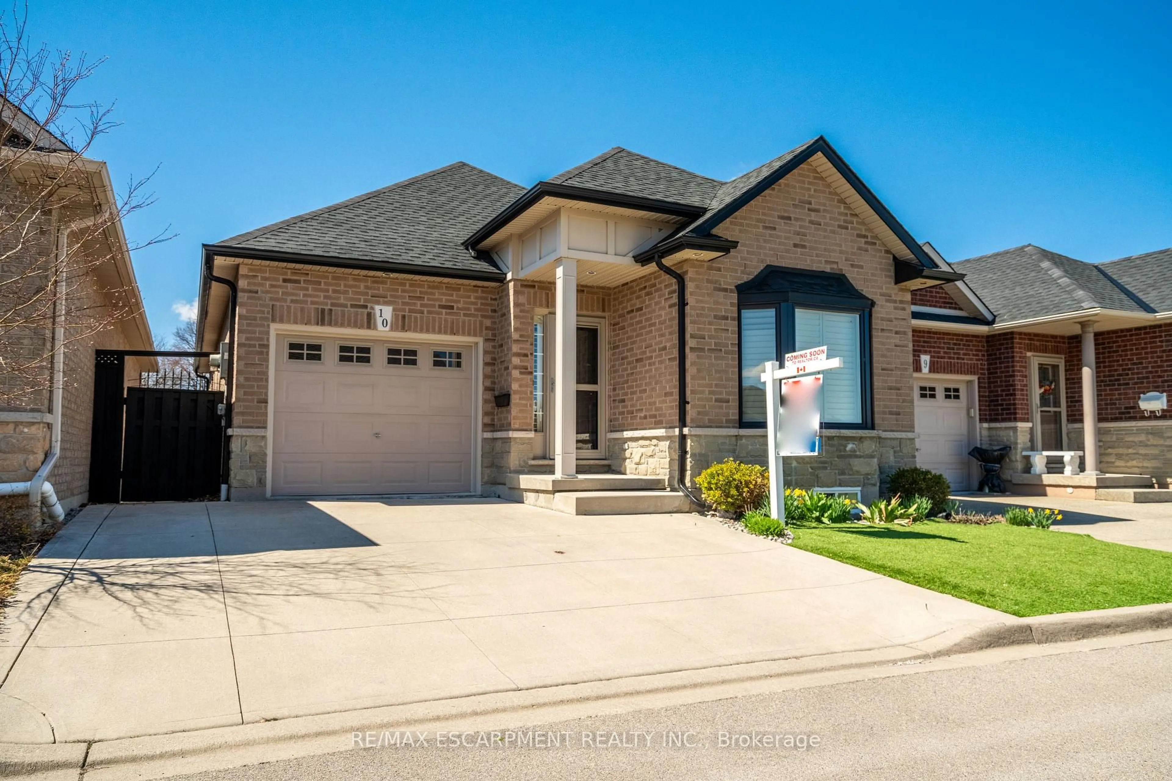 Home with brick exterior material, street for 10 Greenbrook Dr #10, Hamilton Ontario L8G 0A2